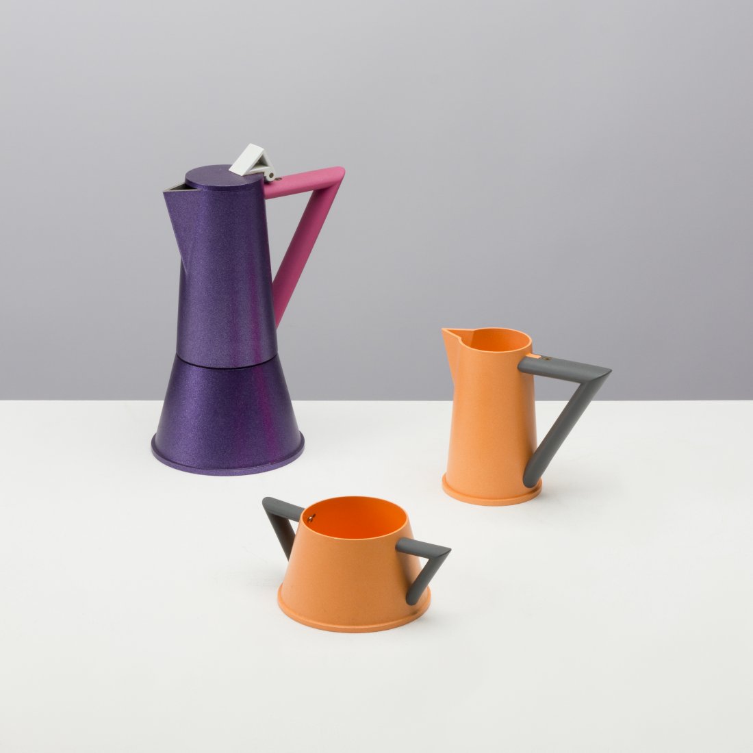 Matteo Thun, Coffee Service: Italy, 1980s anodized aluminum largest 9.75 x 6.5 x 4 7/8; 3 lbs Stove top espresso maker with cream and sugar servers by Matteo Thun. Provenance: Private collection, NYC post modern, memphis, design,