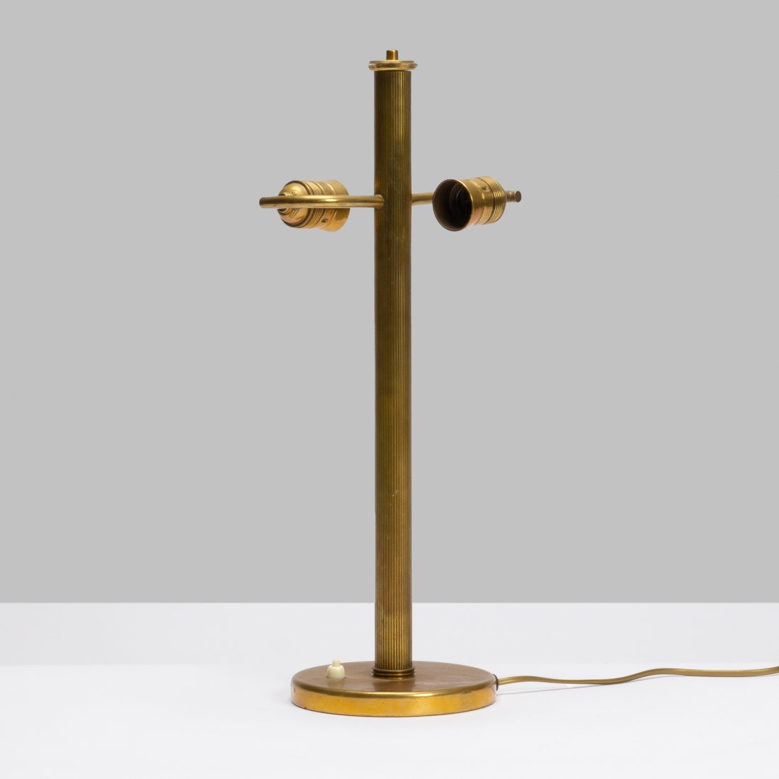 Paavo Tynell, Table Lamp: Finland, c. 1932 brass 20.25" x 6.5" Uncommon table lamp by Paavo Tynell; Taito OY; manufacturer mark under base. Provenance: Private Collection, NYC Literature: 1932 Taito OY Catalog, p. 3, illustrat