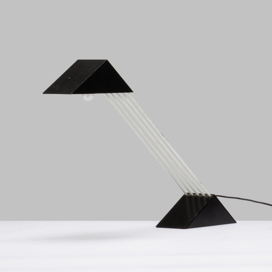 Italian, Desk Lamp: Italy, 1984 metal, rubber, lacquer 14.5" x 22" x 3 1/8" Minimalist lacquered metal desk lamp with weighted triangular base and shade. Provenance: Private collection, NYC key: modern, mid century, post