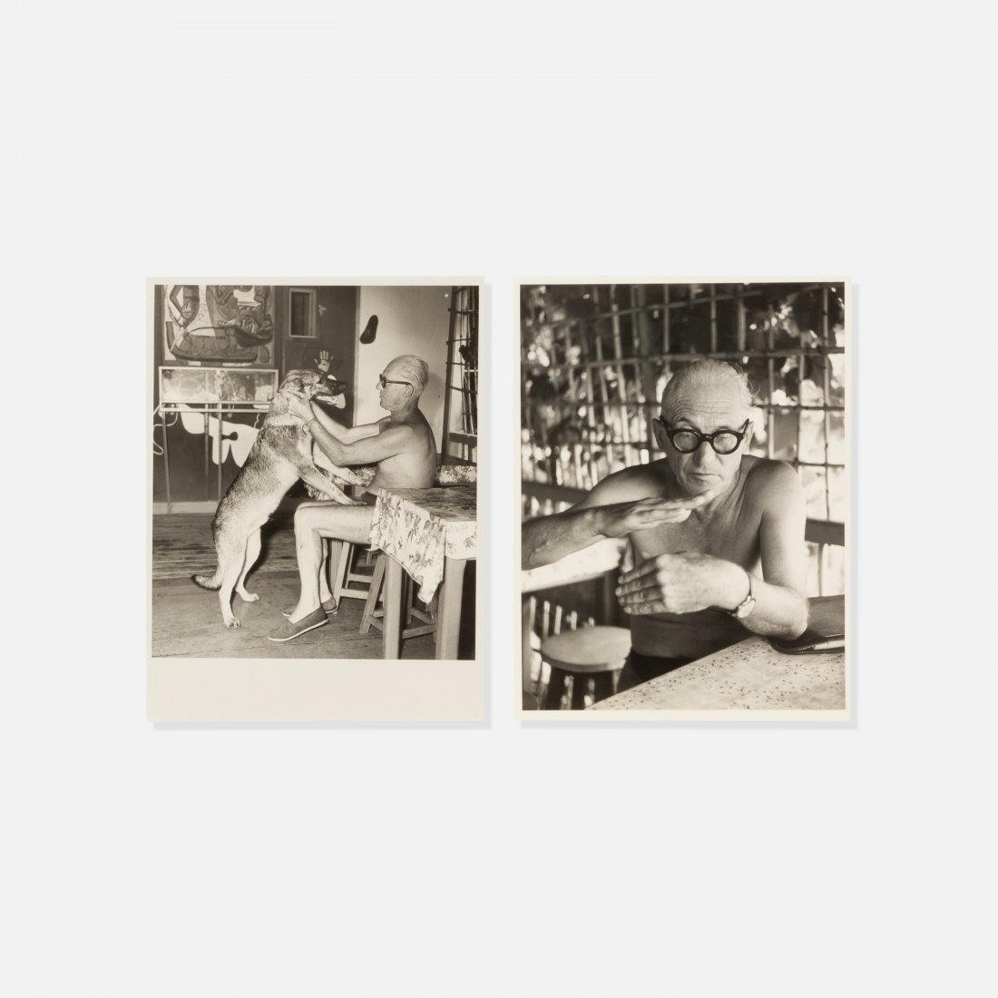 Ed Quinn, Two Photographs of Le Corbusier: c. 1950s silver gelatin print 9.5" x 7" Two photographs of Le Corbusier by Ed Quinn, in Roquebrune-Cap-Martin, with his dog and seated at table. key: photography, modern art, design, modernist