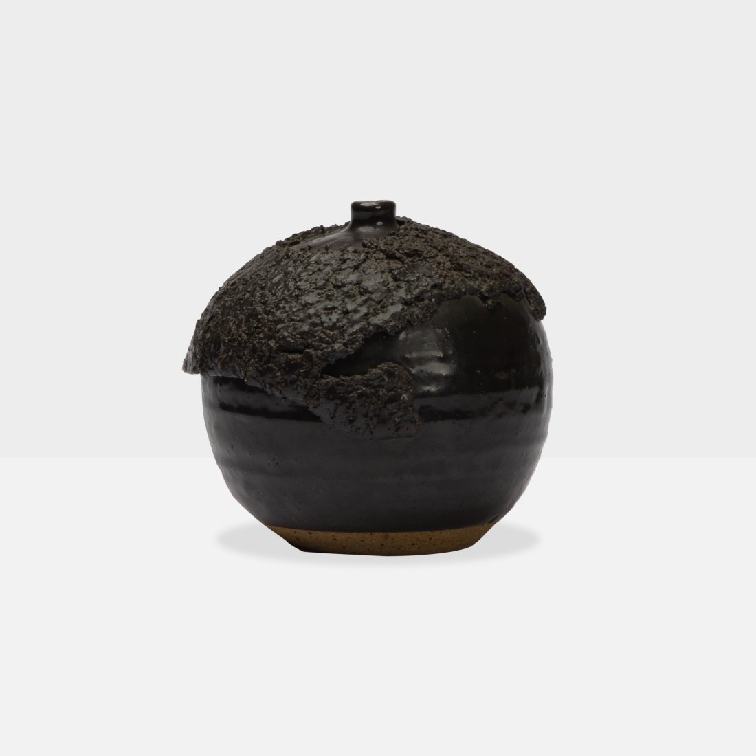Attributed to Lee Shank, Weedpot: USA, 1968 ceramic, glaze 6.25” x 7” diameter Small vessel with black lava glaze attributed to Lee Shank, 1968. Incised signature and date to underside [SHANK 1968]. Tags: craft, california