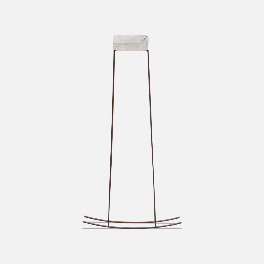 Transcendental, Kinetic Glass Sculpture: USA, c. 1975 cast glass, metal 39” x 20” x 7” Kinetic sculpture with lateral rocking steel base supporting a prism-like piece of cast glass in the form of a pentagon. Tags: minimalis