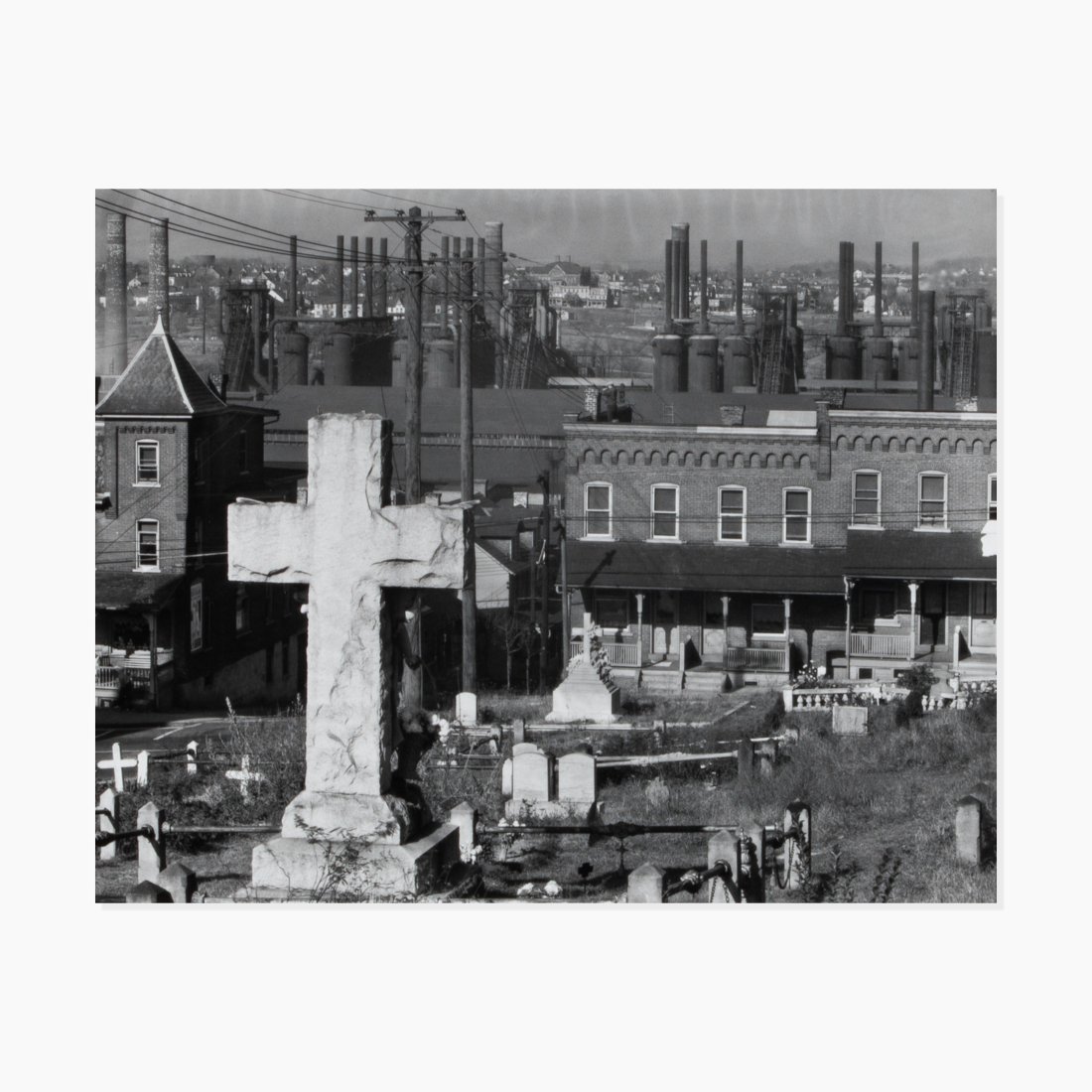 Walker Evans, A Graveyard and Steel Mill in Bethlehem, Pennsylvania: Pennsylvania, 1935 printed later gelatin silver print 18” x 14” matte 9 1/2” x 7 1/2” image A Graveyard and Steel Mill in Bethlehem, Pennsylvania by Walker Evans with estate bl