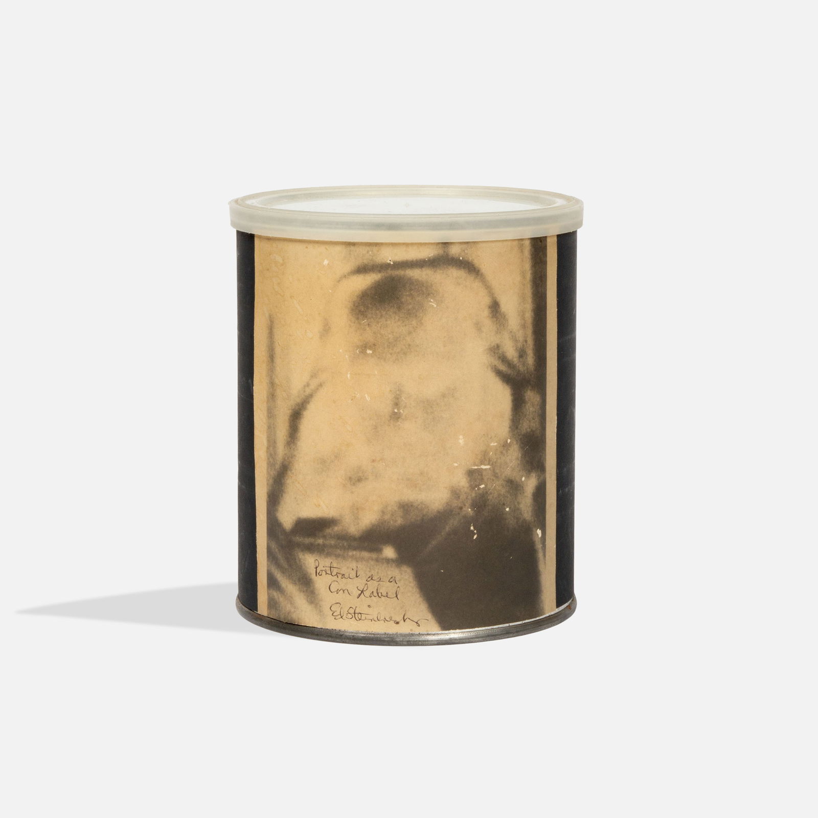 Ed Steinberg, Portrait as a Can Rabel: USA, Late 20th Century printed on tin can 8" x 5 3/4" Sealed can with an unknown sounding object inside. Can wrapper in an abstract videographic still image. Titled [Portrait as a Can Rabel] and signe