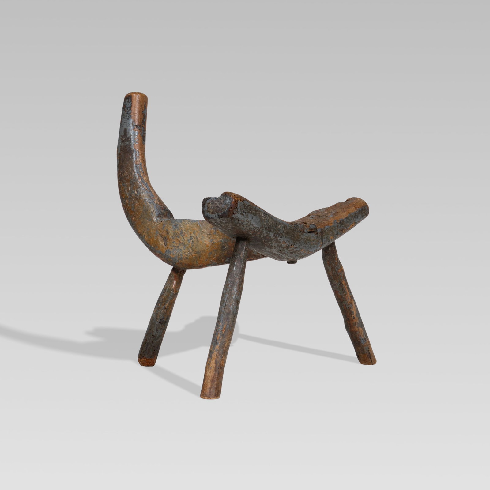 Vernacular, Carved Birthing Chair: USA, c. 1900 16 1/2 x 19 3/4 x 14 inches 9 1/2 inches seat wood, paint Comprised of five carved and pegged pieces, retaining traces of original gray/blue paint. Pickup and shipping from Treadwell, NY.