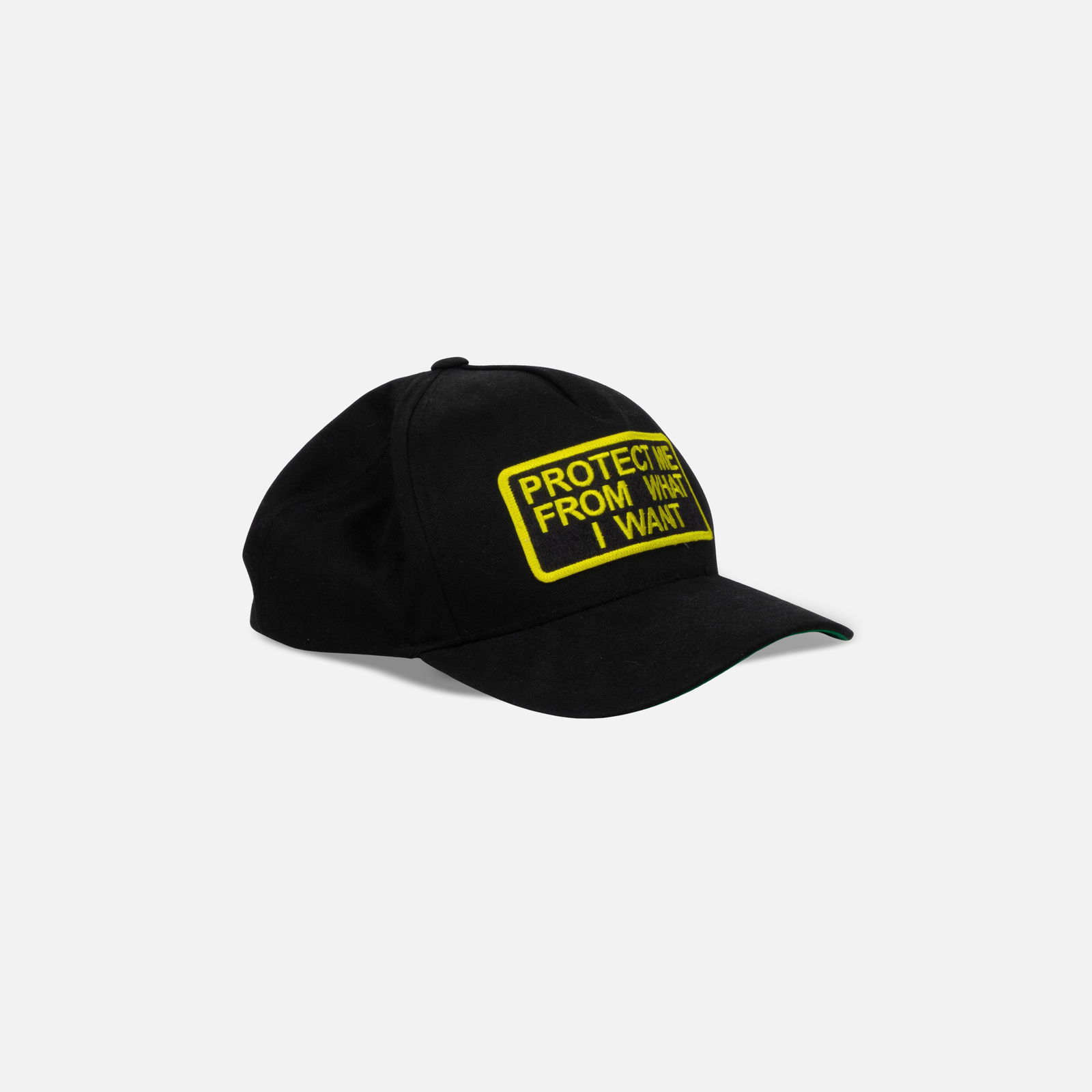 Jenny Holzer, Guggenheim Musuem, Protect Me From What I Want Hat: USA, 2024 adjustable fit six panel embroidered hat with velcro strap Protect Me From What I Want hat by Jenny Holzer, featuring the artist’s statement from ‘Survival’ (1983-1985). This item is l