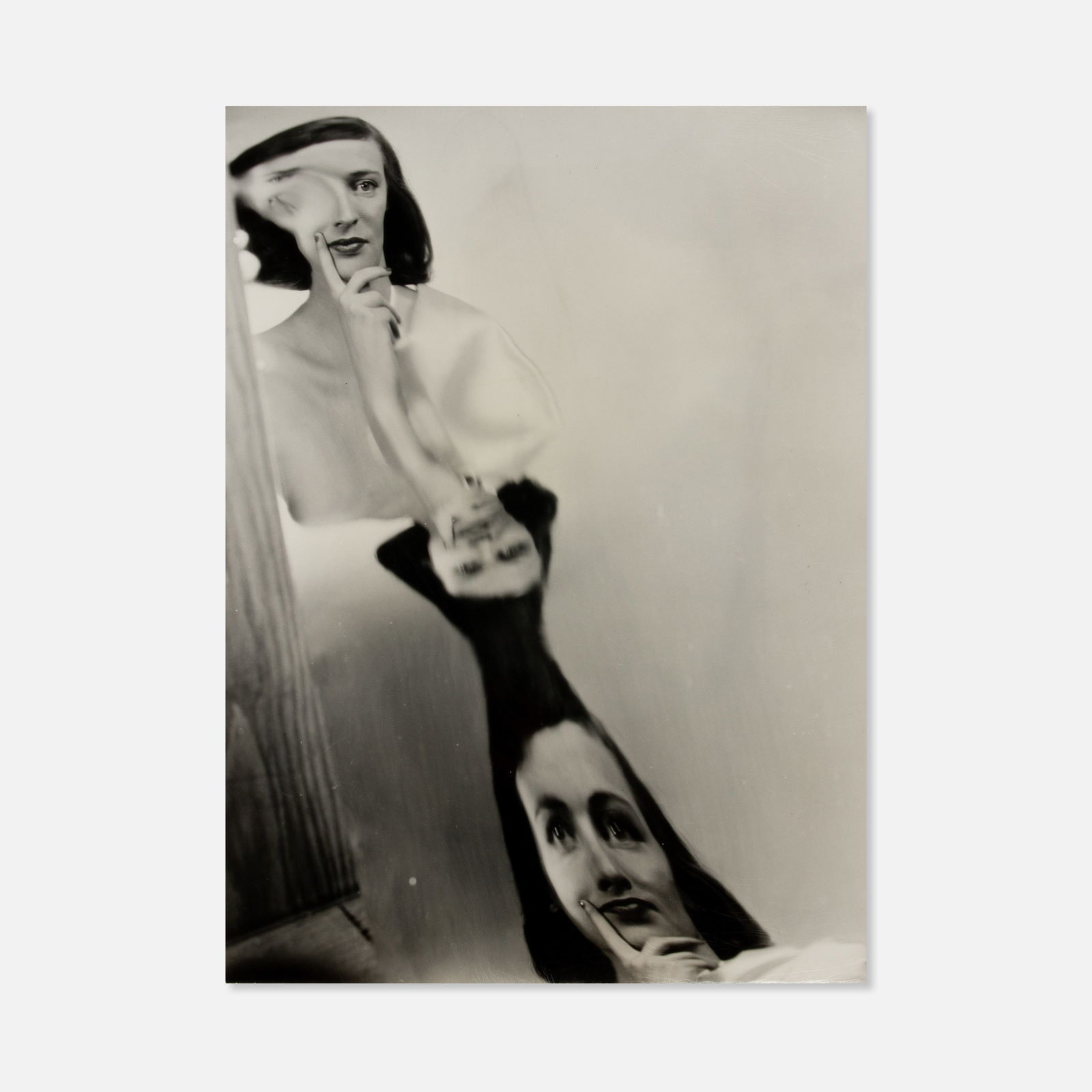 Erwin Blumenfeld, Distortion Portrait: USA, c. 1945–1946 20" x 16" mat 13" x 10" sheet vintage silver print Numeric notation [46] and artist's estate stamp to verso. This item is located in our Treadwell, NY warehouse. Pickup and