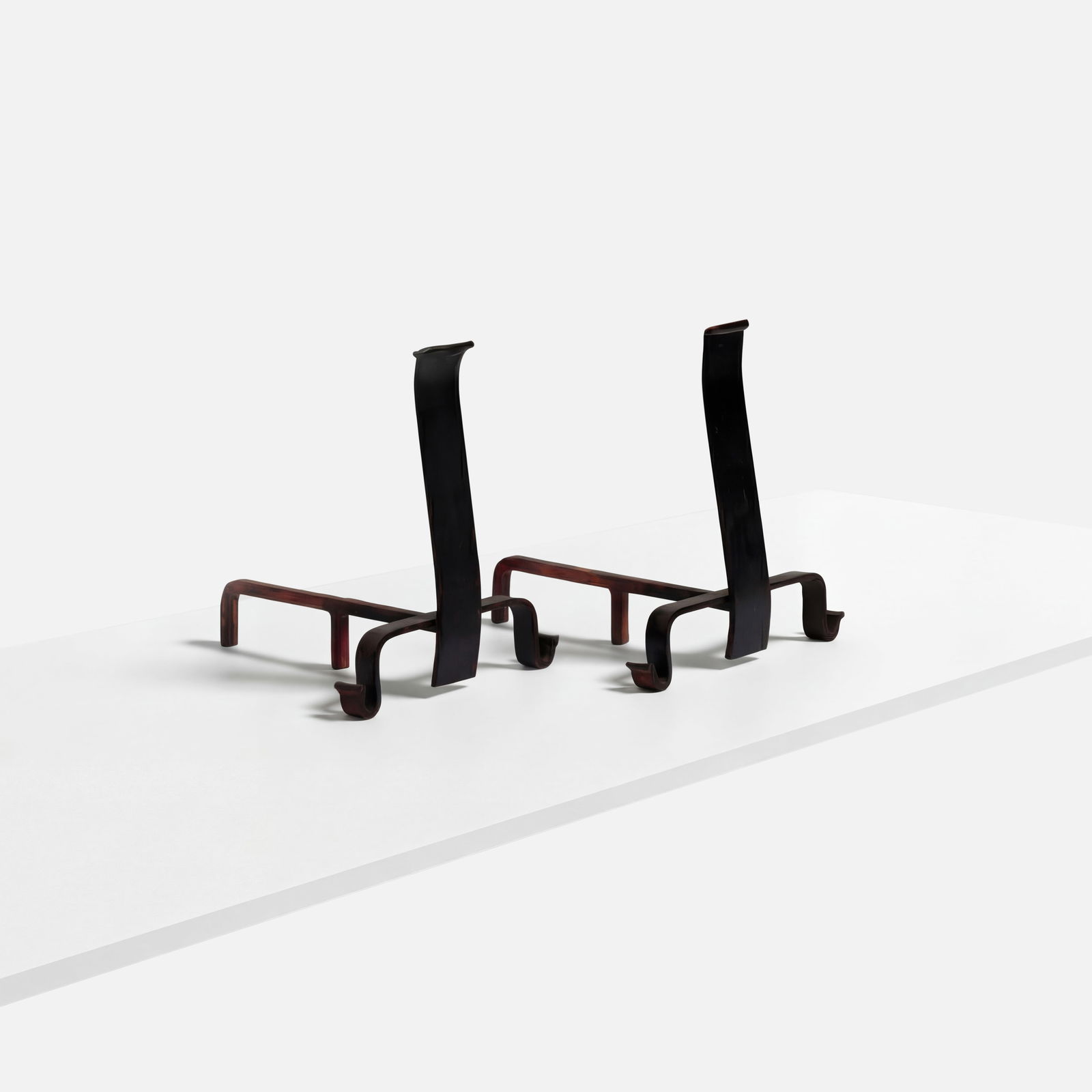 Arts and Crafts, Andirons: USA, c. 1910–1920 18 1/2" x 16" x 18 1/2" iron This item is located in our Treadwell, NY warehouse. Pickup and shipping options available upon request.