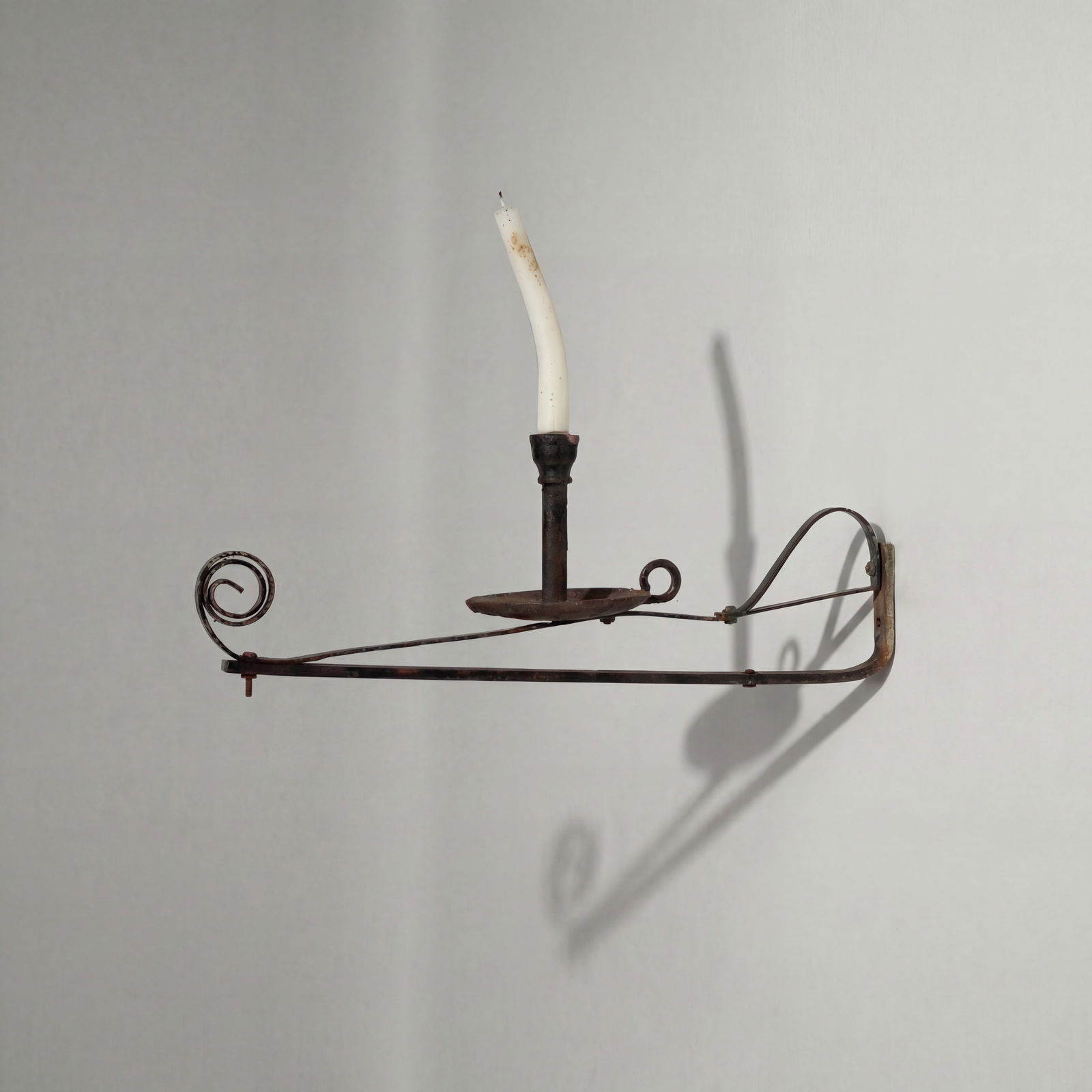 Vernacular, Candle Maker's Trade Sign: USA, early 20th century 25" x 16 1/4" x 6 1/2" wood, paint, iron Having a sculptural, painted wooden candle. This item is located in our Treadwell, NY warehouse. Pickup and shipping options