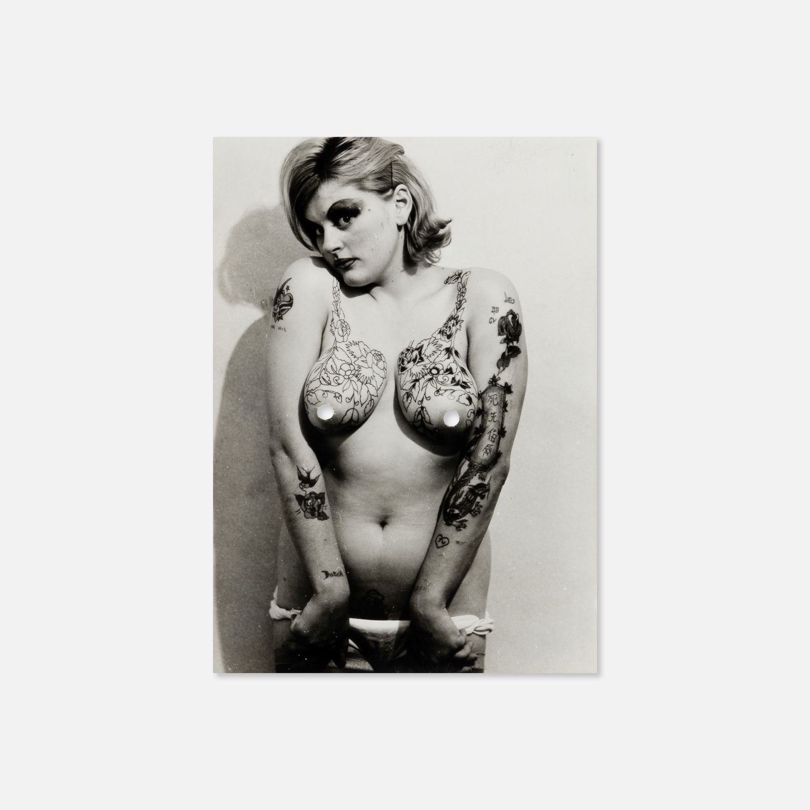 Tattoo, Bev Robinson (Cindy Ray), Photo of Tattooed Woman with Nipple Cutouts: Australia, c. 1960s 6 5/8" x 4 3/4" vintage silver print Photographer's credit stamp verso [Miss Cindy Ray P.O. Box 34, Ivanhoe, Victoria, Australia]. Bev Robinson (Australian, b. 1942) modeled for an