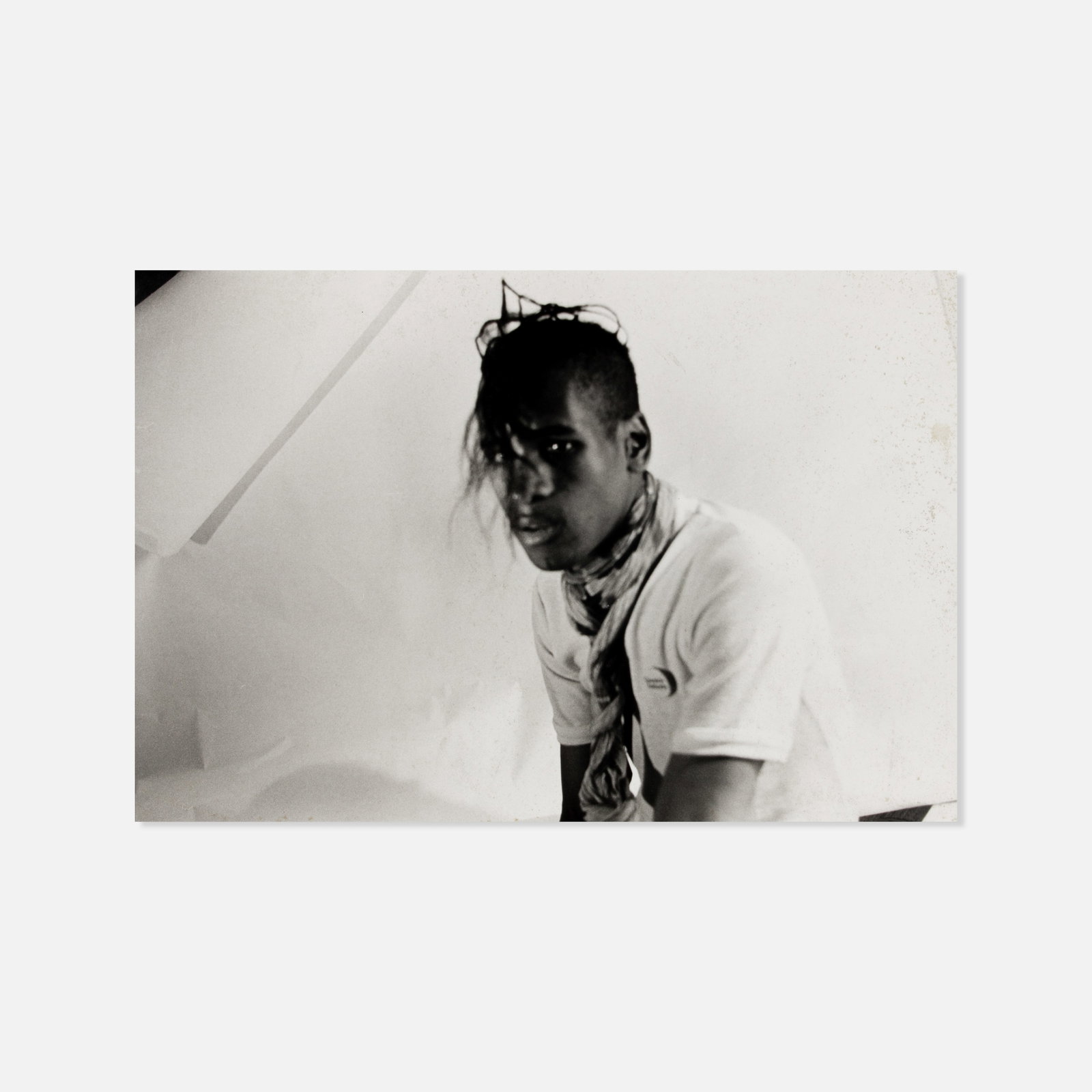 Tim Greathouse, (Sur) Afrika: USA, 1981 14" x 11" silver gelatin print Signed, dated, stamped, numbered, and titled in pencil to verso: [3/5]. Tim Greathouse (American, 1950–1998) was a photographer, graphic designer, and