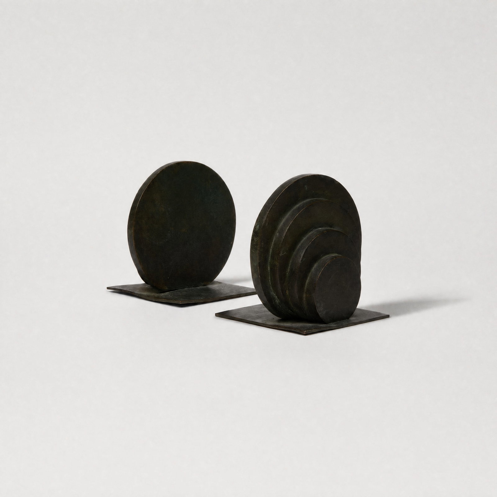 Art Deco, Bronze Bookends: USA, c. 1930s 3 1/2" x 3 3/4" x 3" solid bronze, bronze mounts This item is located in our Treadwell, NY warehouse. Pickup and shipping options available upon request.