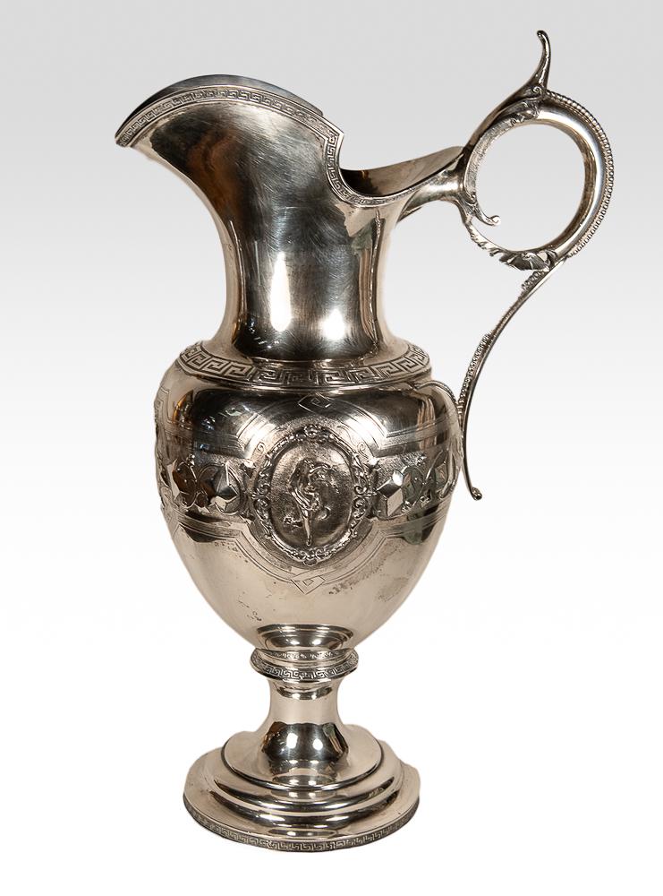 Duhme Winged Victory coin silver pitcher: Monumental Duhme & Co. Pitcher Cincinnati, Greek key motif with two winged victory medallions, inscription Joe and Sallie from Abe and Annie, beautiful fine chasing marked Duhme & co. in bottom cavity