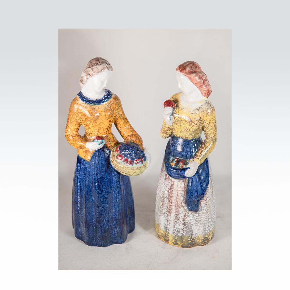 Michael Andersen figures, Autumn Seasons: marked on bottom, one with paper label Dimensions: 10" tall Weight: 3 lbs.