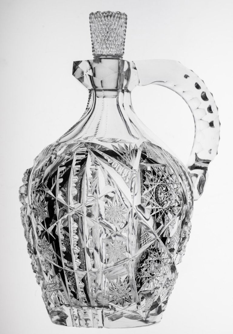 Beautiful Libbey Corona Brilliant Cut Glass Whiskey Decanter: Incredible example of Libbey at the top of their game. Cut in their Corona design (AKA Spillane) with a triple notched handle and fully cut stopper. Both pieces are signed with the Libbey saber tradem