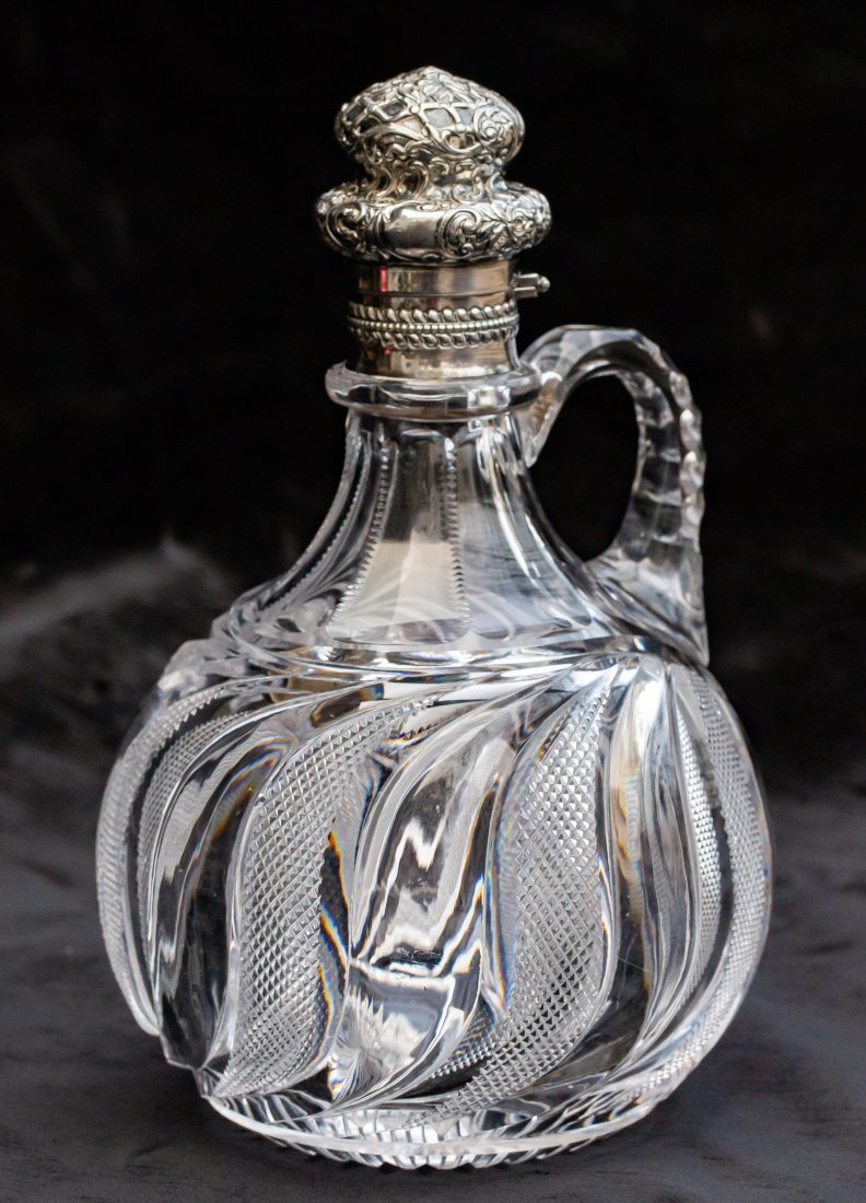 Truly Singular Hawkes & Gorham Silver Brilliant Cut Glass Swirling Decanter: I think this decanter, likely cut by Hawkes, is one of the most stunning they ever made. It's just classy looking on all fronts - from the alternating clear tusks (very difficult to cut) and swirled c