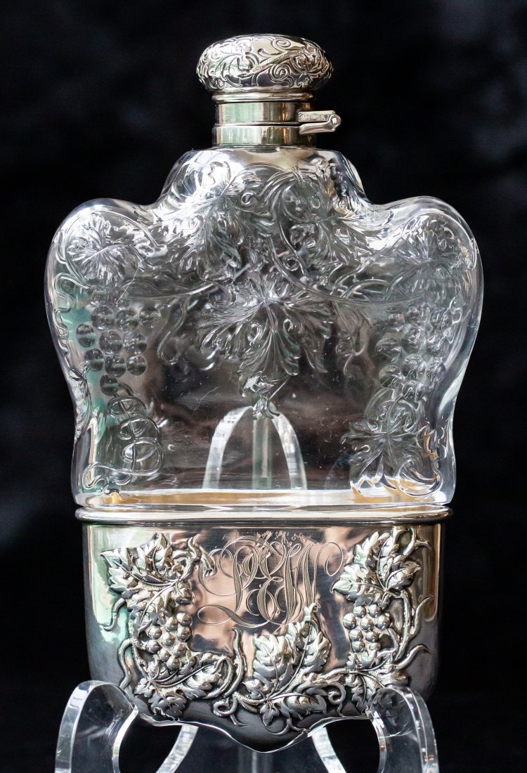 Fabulous Unusual American Brilliant Cut Glass Flask with Sterling Silver Mounts: This is clearly one of the best flasks ever made during the period - not only is the shape unusual, but the engraving is extremely well done polished grapes/vintage. Add to that that the silver matche