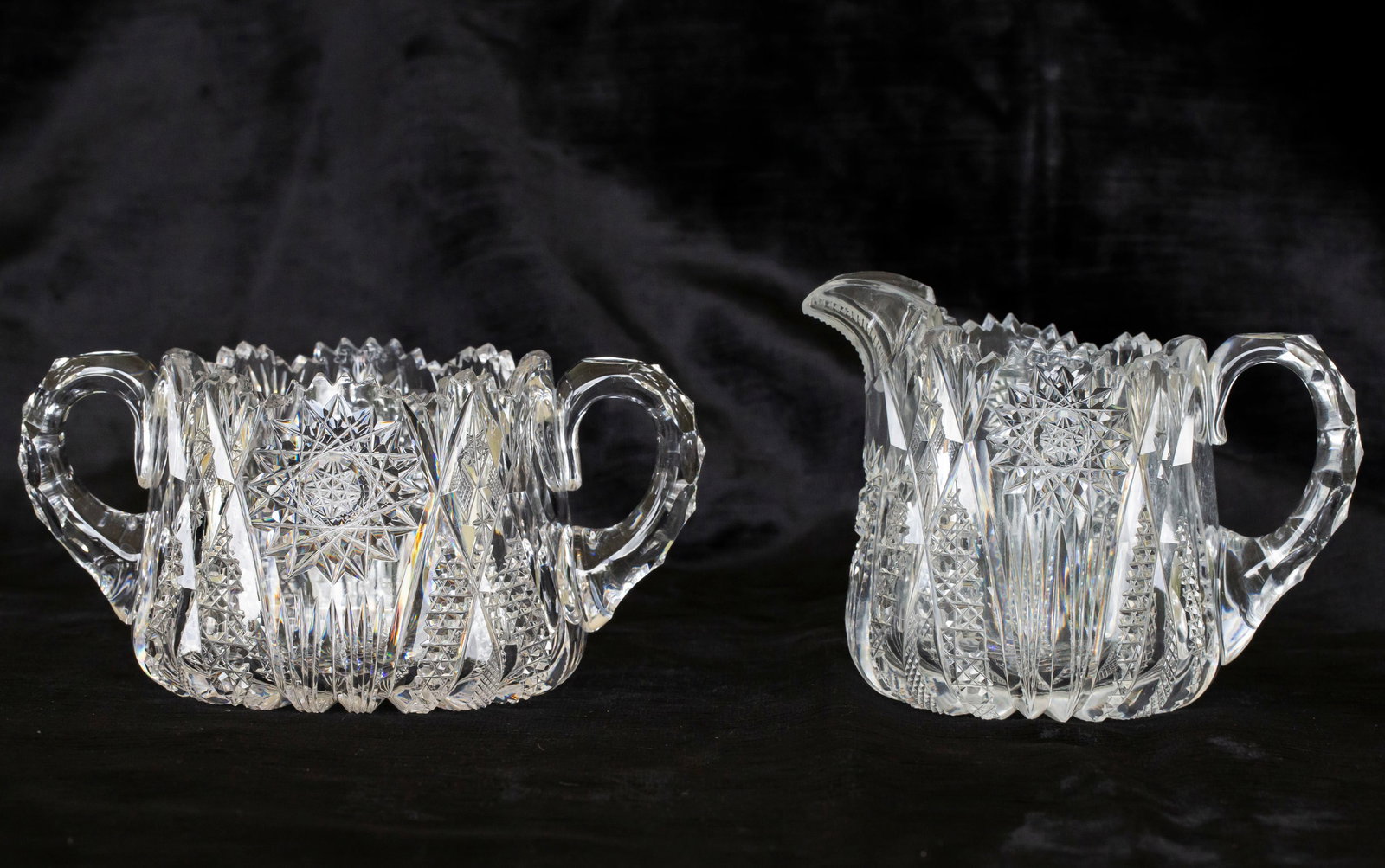 Kelly & Steinman Cream and Sugar & Straus? Nappy Brilliant Cut Glass: This lot includes a cream and sugar in Kelly & Steinman's Raleigh design and a strawberry-diamond and fan nappy likely cut by Straus.