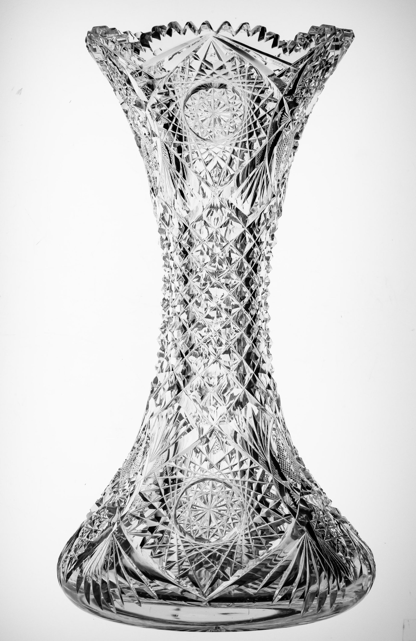 Gorgeous J. Hoare Monarch American Brilliant Cut Glass Vase Corset Vase: This exaggerated corset vase is one of the best pieces of J. Hoare's monarch I've ever seen. The diamond-point cutting that runs along the center of the vase, dividing the pattern in two, is some of t