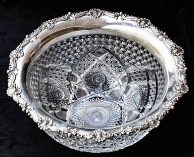 Incredible J. Hoare Gorham Sterling Silver American Brilliant Cut Glass Bowl: This giant bowl was cut by J. Hoare and mounted by Gorham Silver. The design of this bowl is intense - featuring an awesome modified filled in, cross-cut cane all around the edge. The interior has 6 d