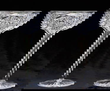 Unusual Pair of Libbey American Brilliant Cut Glass Hollow Stem Champagnes: This is a very unusual pair of extra tall, hollow stem champagnes both signed Libbey in their Venetia pattern. They also feature an unusual rayed star on the base.