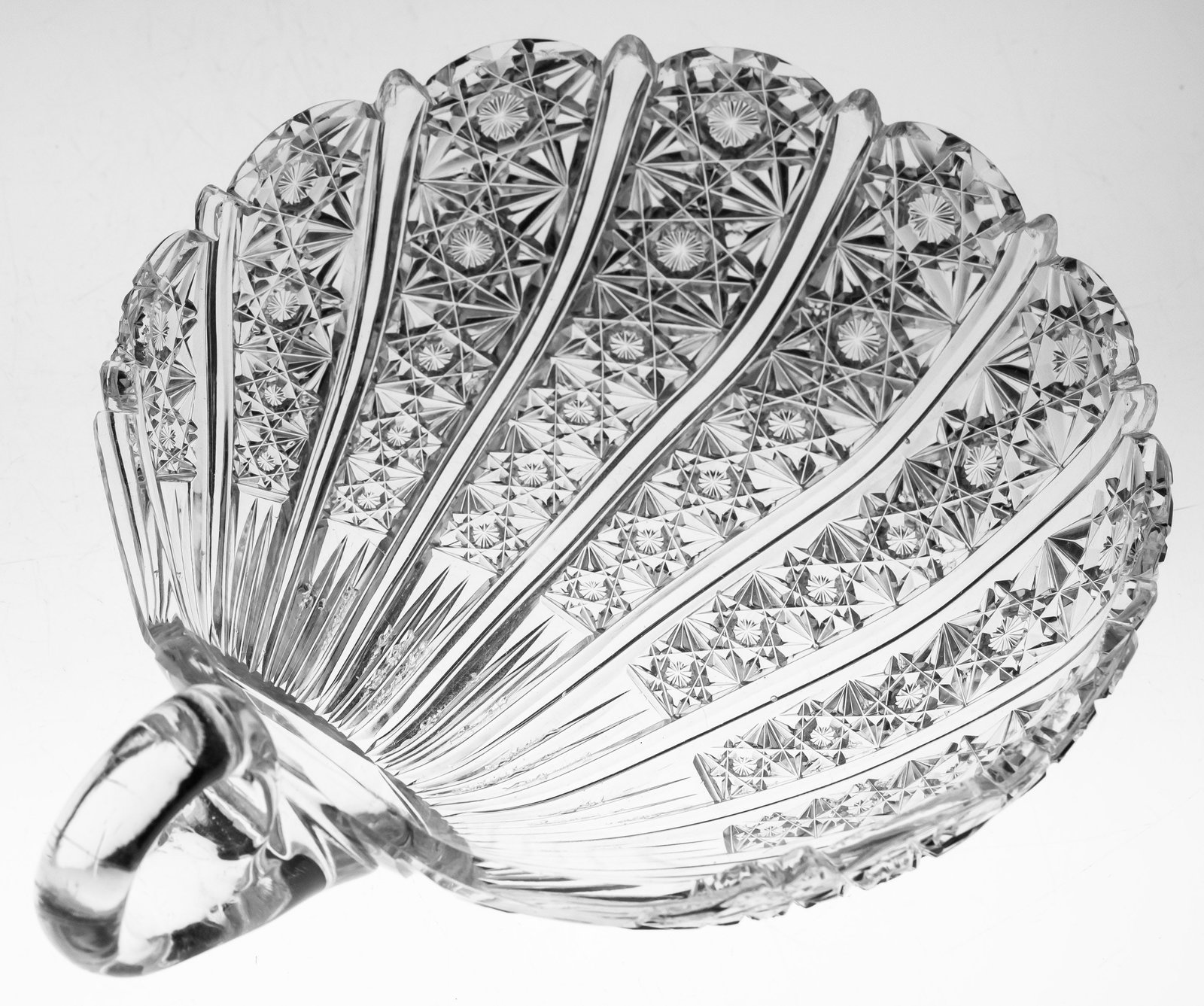 Unusual American Brilliant Cut Glass Shell Nappy with Russian Cutting: Unusual shell nappy with Russian cutting in bands to give it a shell-like design.