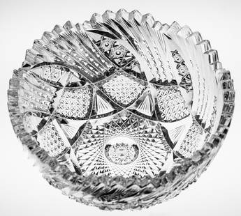 Nice Swirling American American Brilliant Period Cut Glass Bowl: Gorgeous deep bowl cut with a swirling motif that features clear-button hobstars, notching, modified nailhead, and deep center hobstar. This bowl is in overall great condition but has a one slanted ch