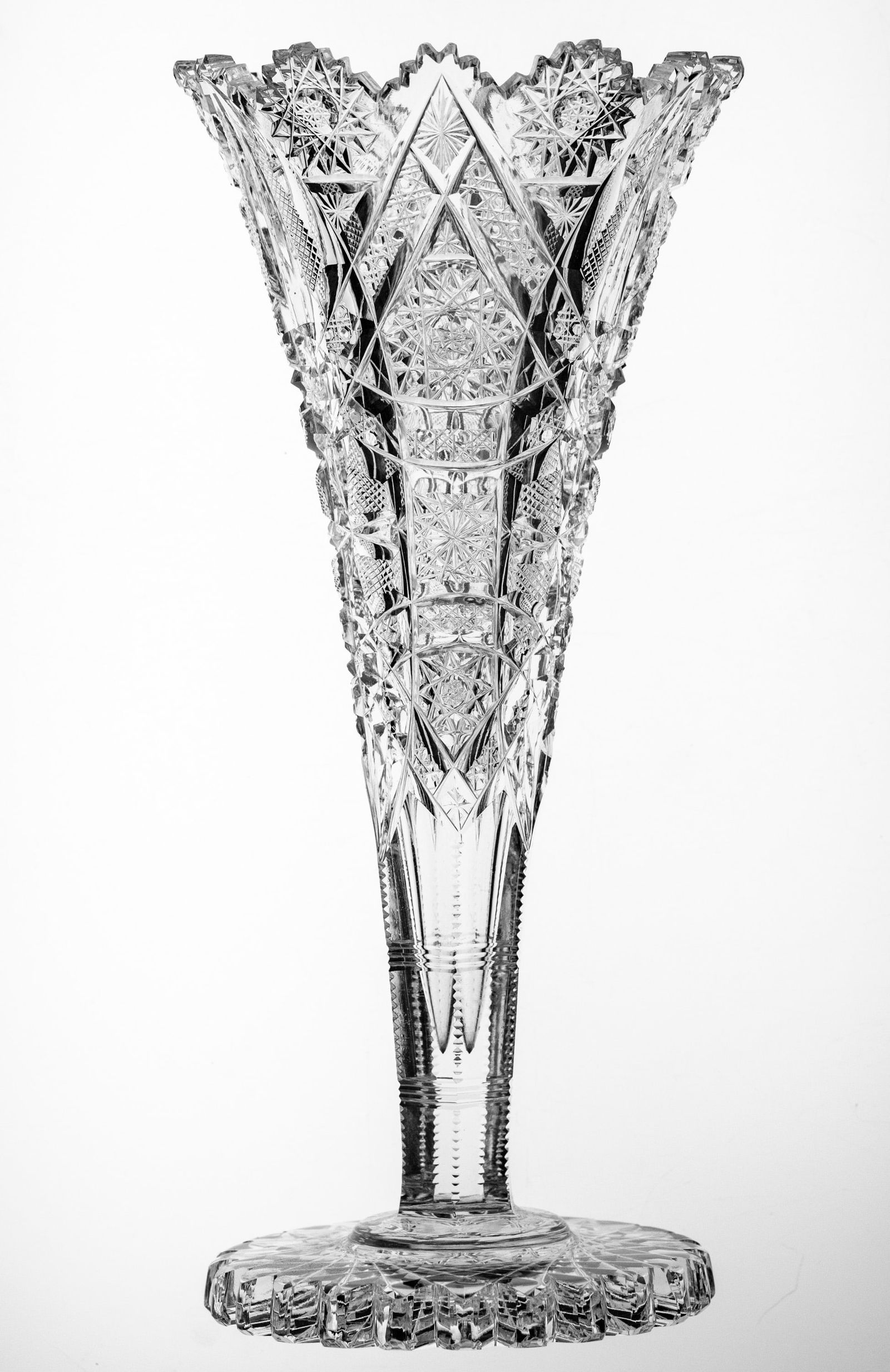 Precious J. Hoare Eleanor American Brilliant Period Cut Glass Trumpet Vase: This precious vase features as much detail as you could possibly fit on a smaller piece. Standing only 9 3/4" tall and 4 1/2" wide, somehow the cutters at J. Hoare were able to fit their gorgeous, ear