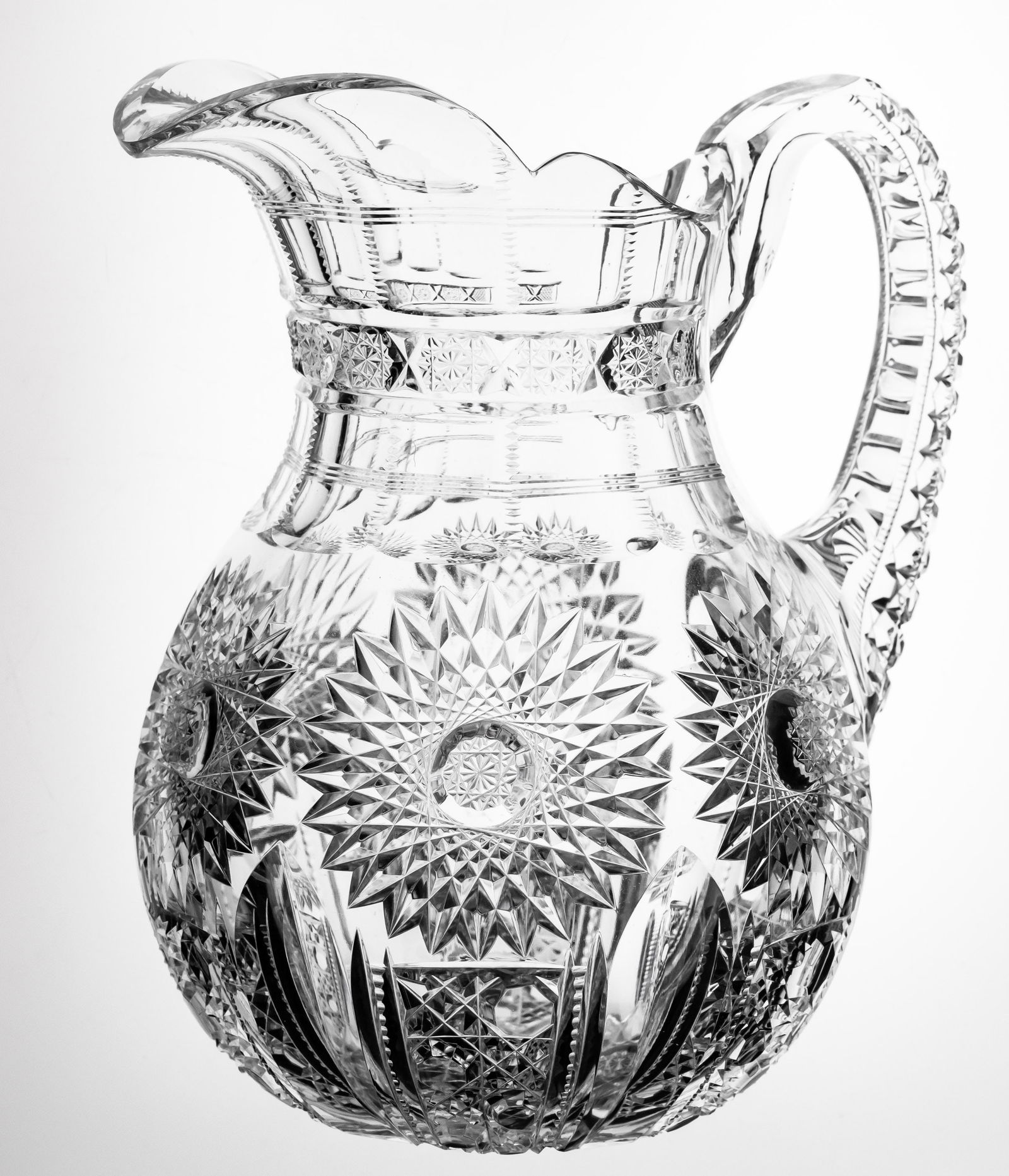 Incredible Massive Dorflinger Gloria American Brilliant Period Cut Glass Pitcher: This incredible pitcher was cut by Dorflinger in their Gloria design. They really went out on this one, first with the giant, bulbous blank. Then there's the fully hobnail cut handle, hobstar band