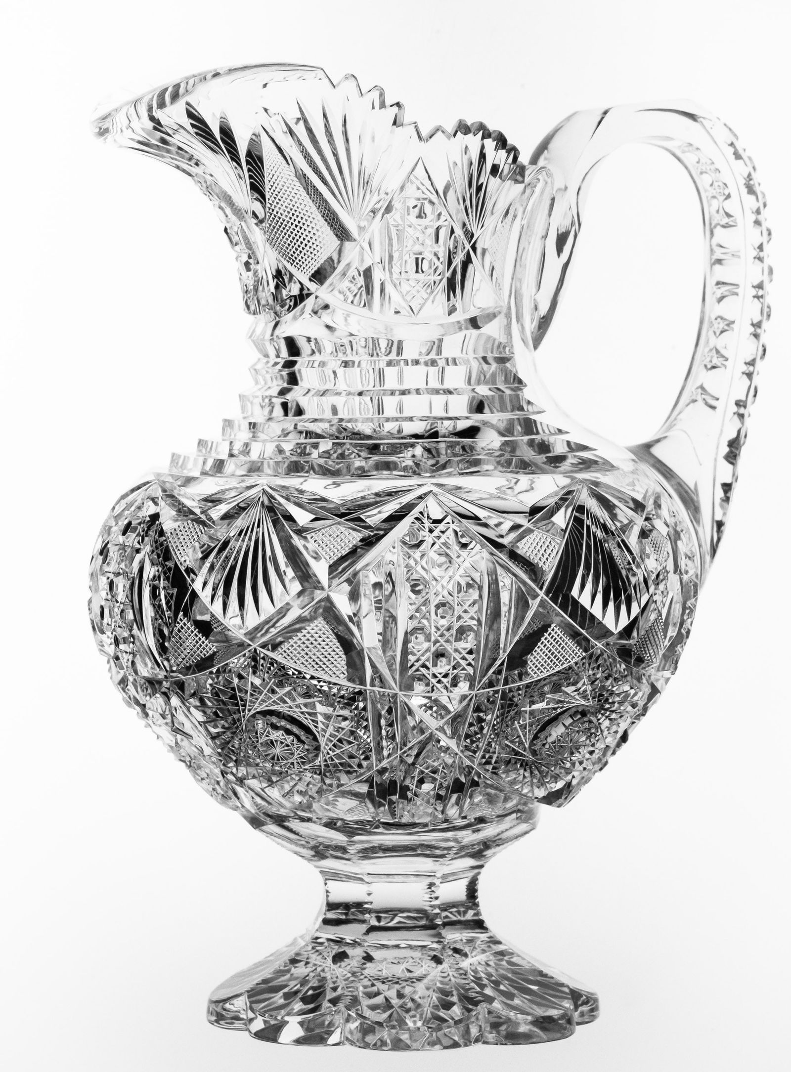 Spectacular Clark Adonis American Brilliant Cut Glass Footed Pitcher: WOW! Amazing pitcher cut by the masters at Clark in their early Adonis design. I love this shape featuring a thick, weighted blank, pattern cut rim and handle, and a hobstar on the base. Just quality