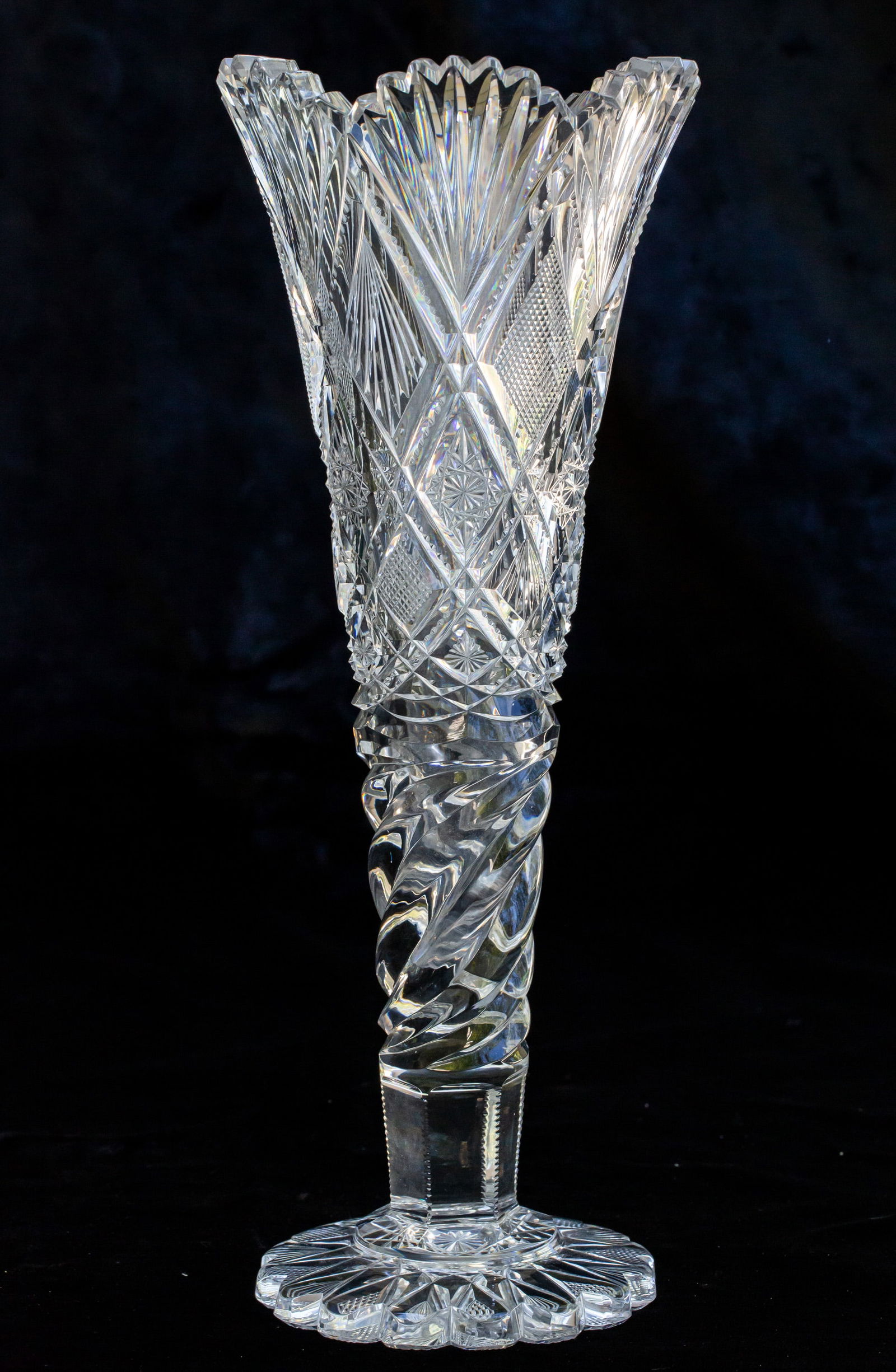 Huge Dorflinger Parisian American Brilliant Period Cut Glass Trumpet Vase - Swirled Stem: This is one of the nicest renditions of Parisian. The design not only lays out well on this trumpet vase, but also has an added hobstar to the center of the design. The lower half of this vase holds n