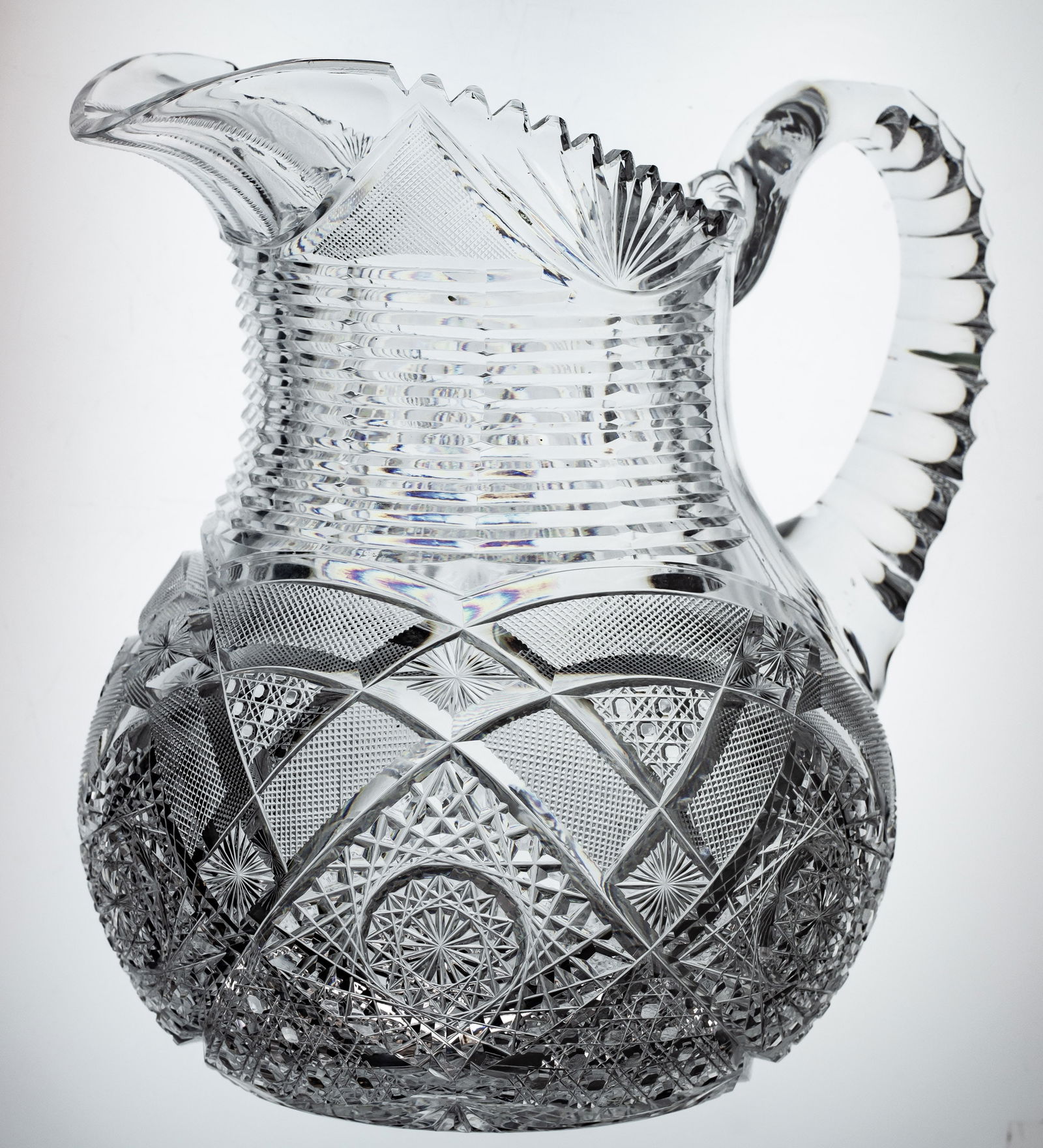 Fantastic Oversized Elmira American Brilliant Cut Glass Bulbous Pitcher: This is a huge pitcher by Elmira in their No. 17 design. Extremely well done with intense step-cut neck hobstar base. This is much larger than most pitchers of this style.