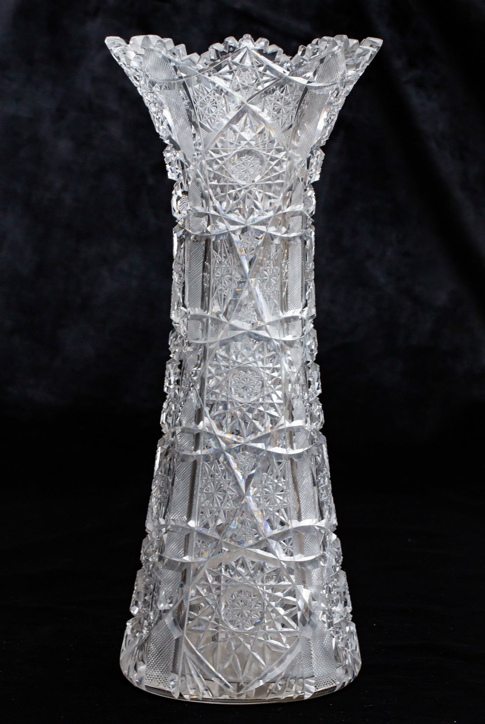 Tall Elmira No. 33 American Brilliant Period Cut Glass Vase: This tall vase was cut by Elmira in their collectible No. 33 design. Tons of cutting covers the piece including a large hobstar base. Stickers on base just for protection and will be removed.