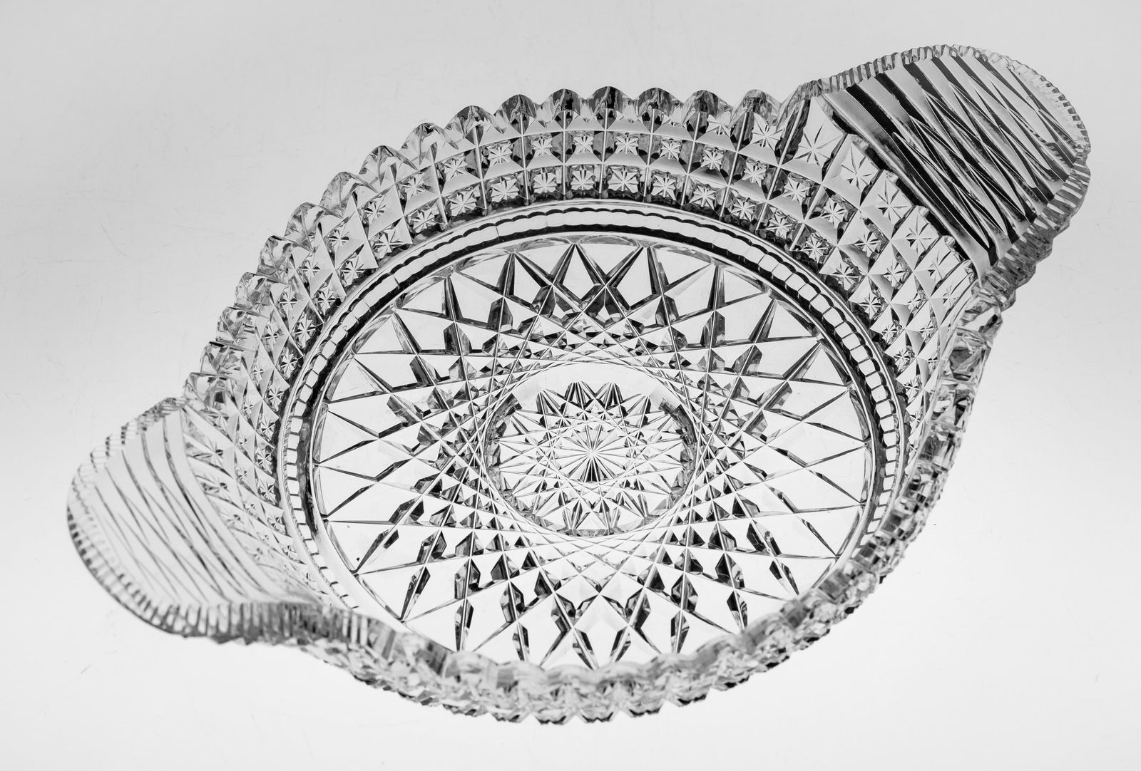Cute Pairpoint American Brilliant Period Cut Glass Handled Dish: Nice handled dish by Pairpoint in their design. Features square, fanned star buttons and compressed St. Louis diamond cut on the handles.