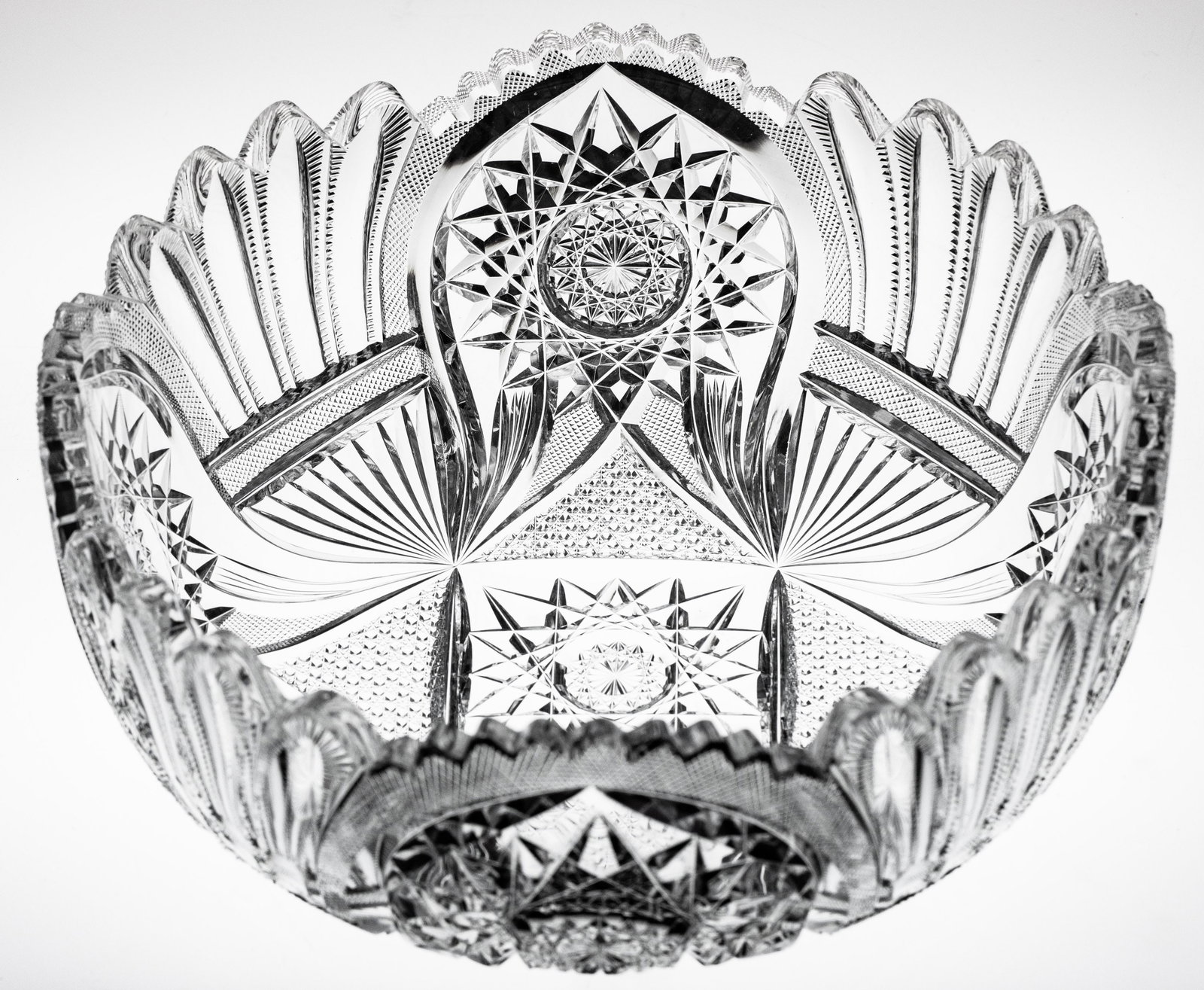 Rare Libbey Lorraine American Brilliant Period Cut Glass Deep Bowl: This bowl was cut and signed in Libbey's seldom-seen Lorraine design. The pattern features extremely unusual scallop cutting flaring directly and seamlessly into the edge. Additionally the center hobs