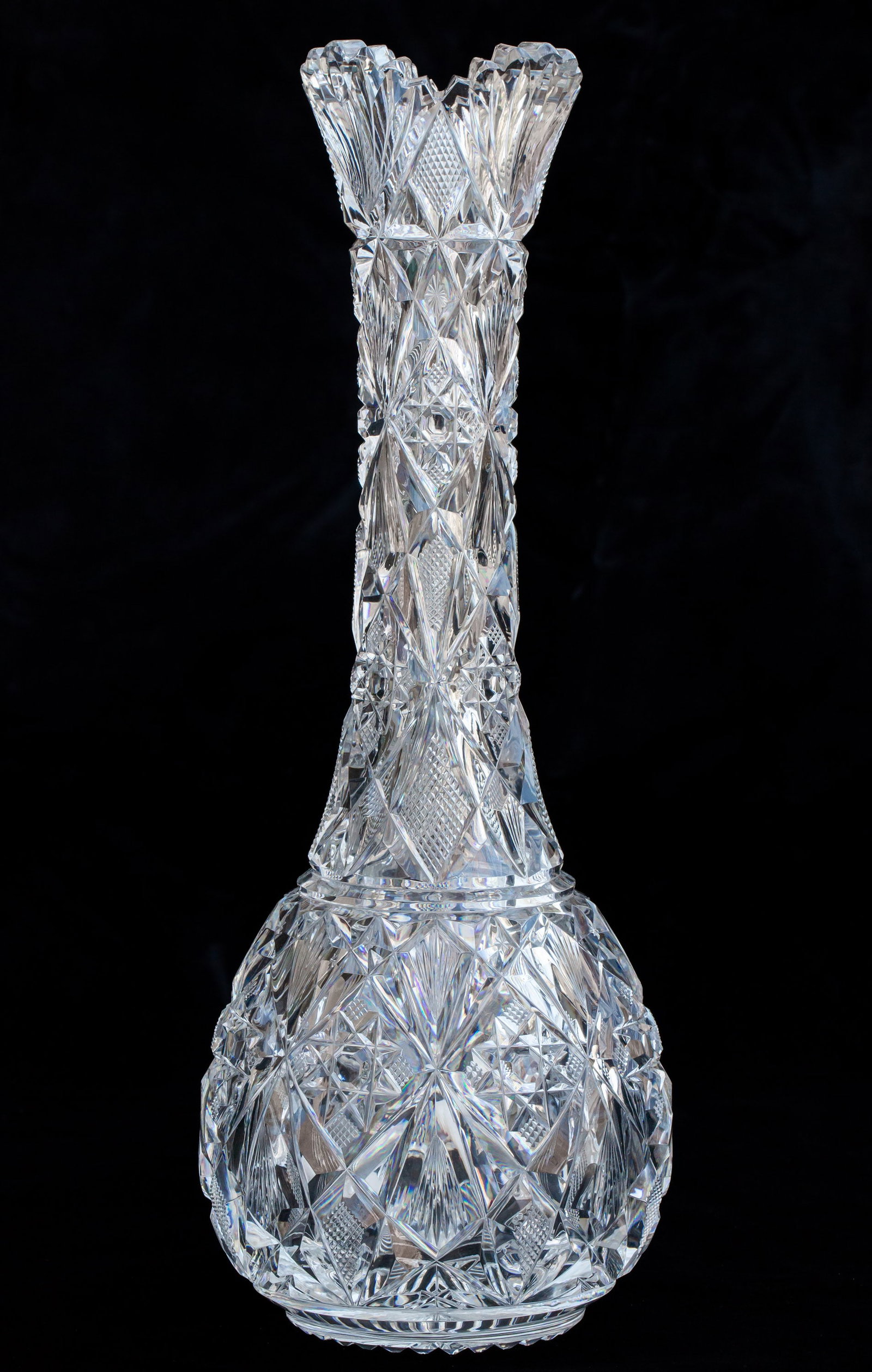 Extremely Unusual Hawkes American Brilliant Period Cut Glass Brazillian Heavy Vase: Incredible bowling pin vase by Hawkes in their early Brazilian design. This is one of the best examples of this pattern I've ever seen - cut top to bottom in the Brazilian pattern. The bottom features
