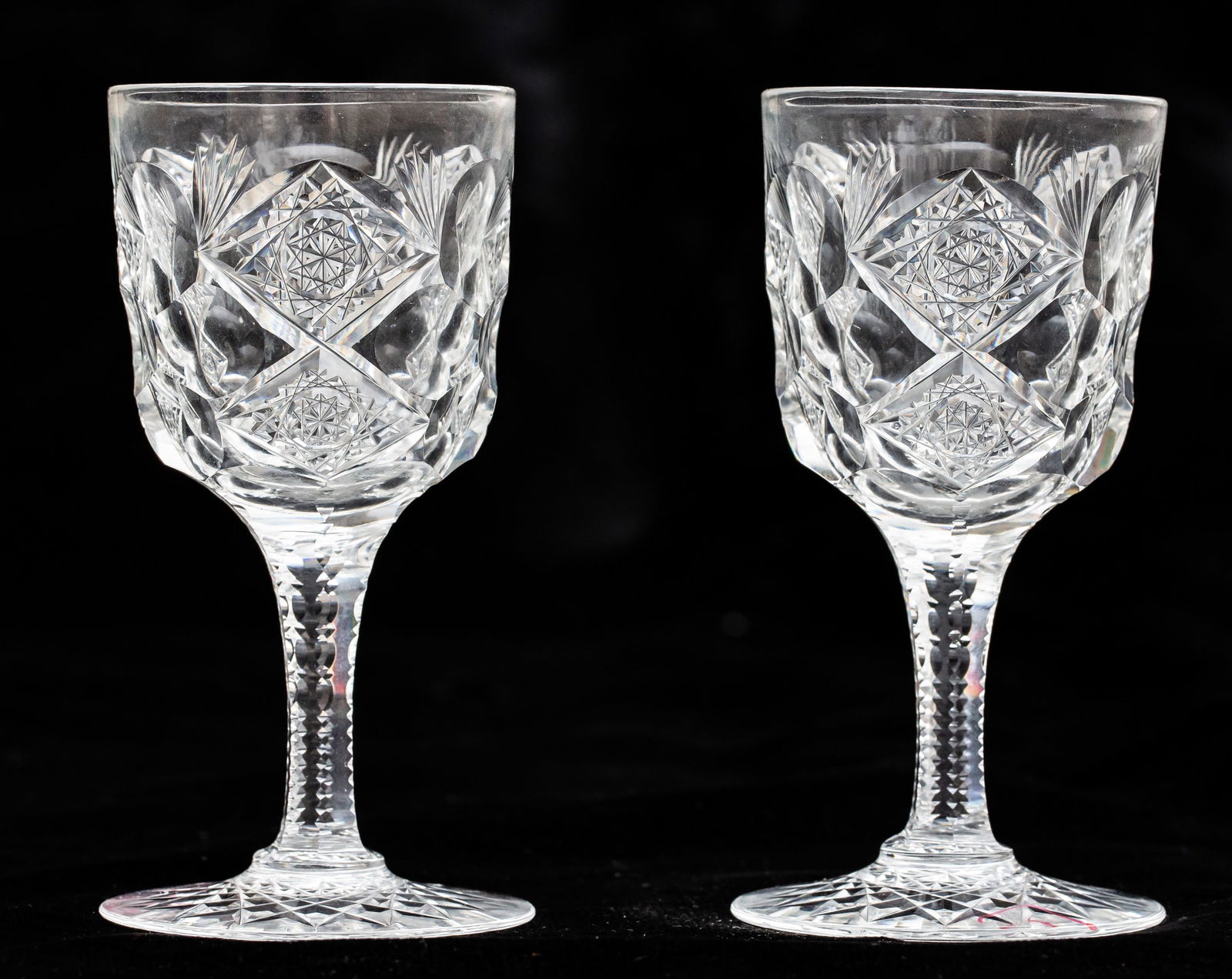 Highly Collectible Pair of Hawkes Queens American Brilliant Period Cut Glass Wine Glass: Really nice example of Hawkes Queens cut on this pair of white wines. Most stemware in Queens is very late in the period and lower quality while these are on nice thick/older blanks. Both pieces are s