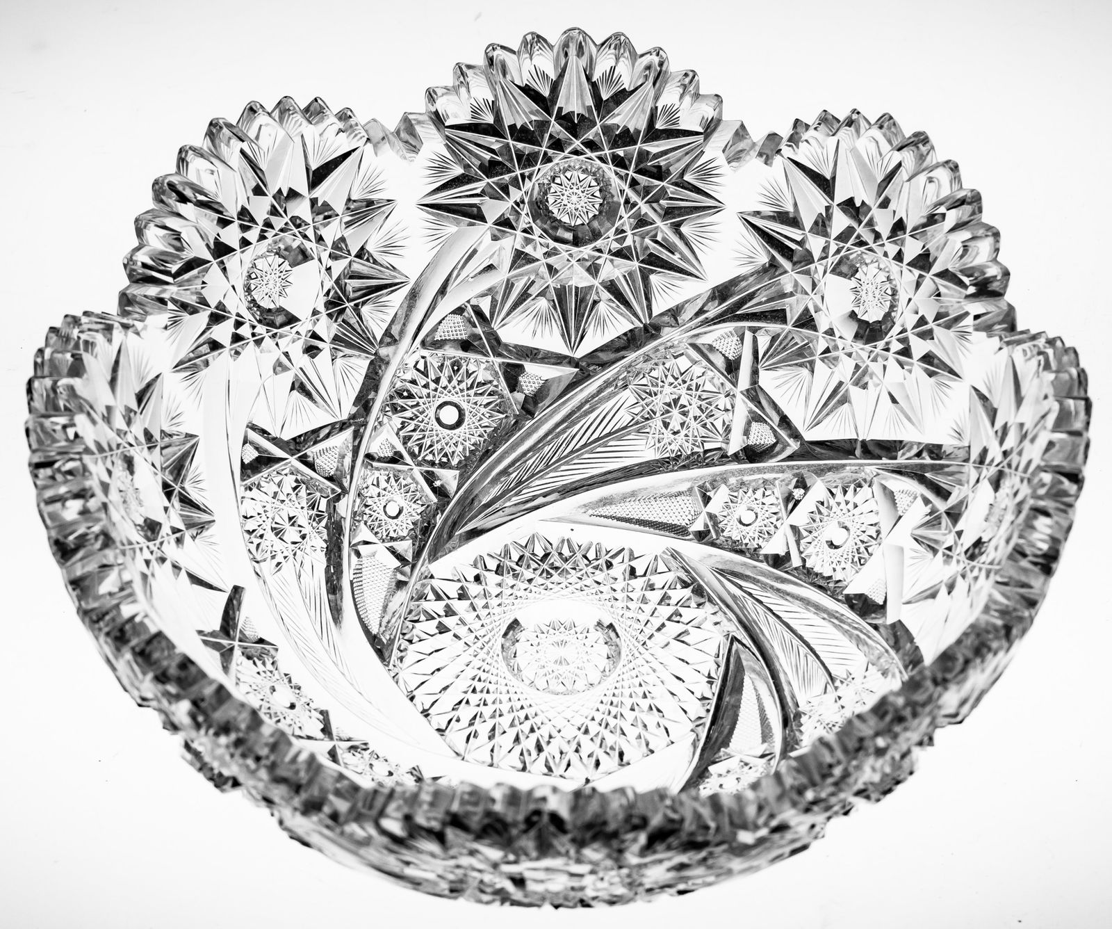 Desirable Libbey Comet/Lenox American Brilliant Period Cut Glass Bowl: This heavy bowl was cut and signed by Libbey in their highly collectible Comet (Lenox) design. The bowl is cut in a myriad of swirling motifs to represent a comet through the sky. I love how the miter