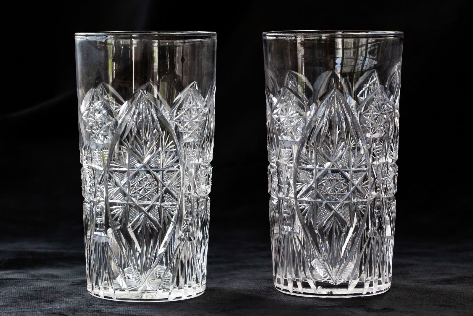 Hard to Find American Brilliant Period Cut Glass Highball Tumblers: These highball tumblers were more than likely cut by Meriden. They feature many of their attributes including large, Florence stars and and checking in between. Highball tumblers are a rarity in cut g