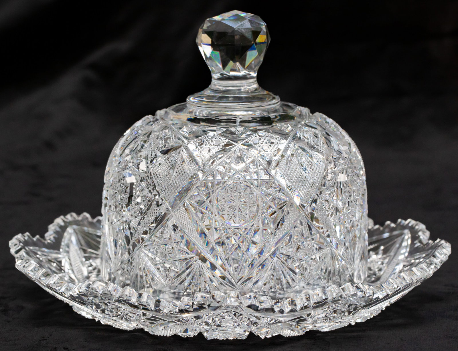 Beautiful Elmira No. 100 American Brilliant Period Cut Glass Butter Dish: This lot features a great butter cover and under plate cut in Elmira's very collectible No. 100 design. The entire pattern is featured on both pieces and features deep hobstars, cane and the No. 100 m
