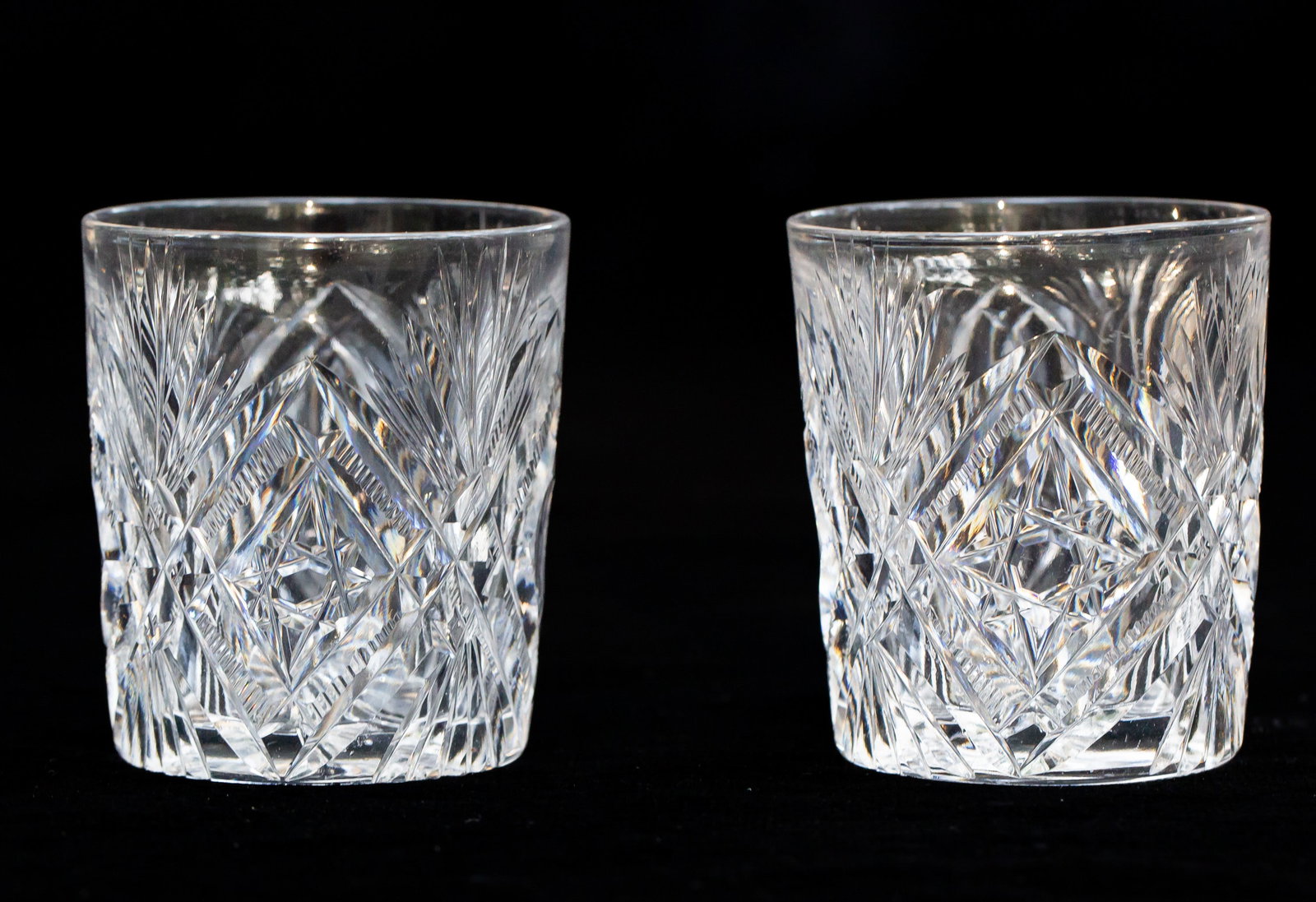 Pair of Hawkes? American Brilliant Cut Glass Shot Glass: Nice pair of shots glasses that look like the work of Hawkes. Features alternating 8-pointed stars and punties.