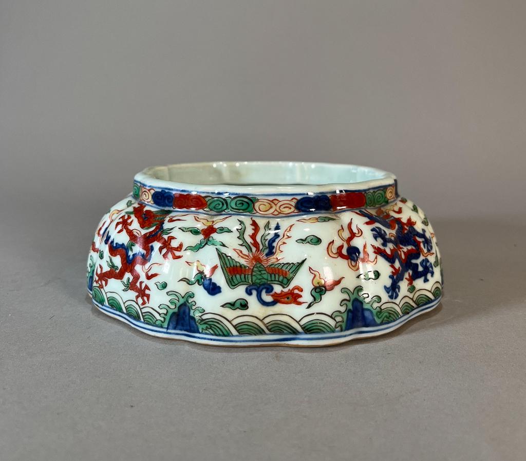Chinese Wucai Porcelain Brush Washer: Chinese wucai porcelain lobed brush washer; with dragons and phoenix chasing pearls motif; six-character mark to base; 2 1/4" x 6 3/4" (approx.)