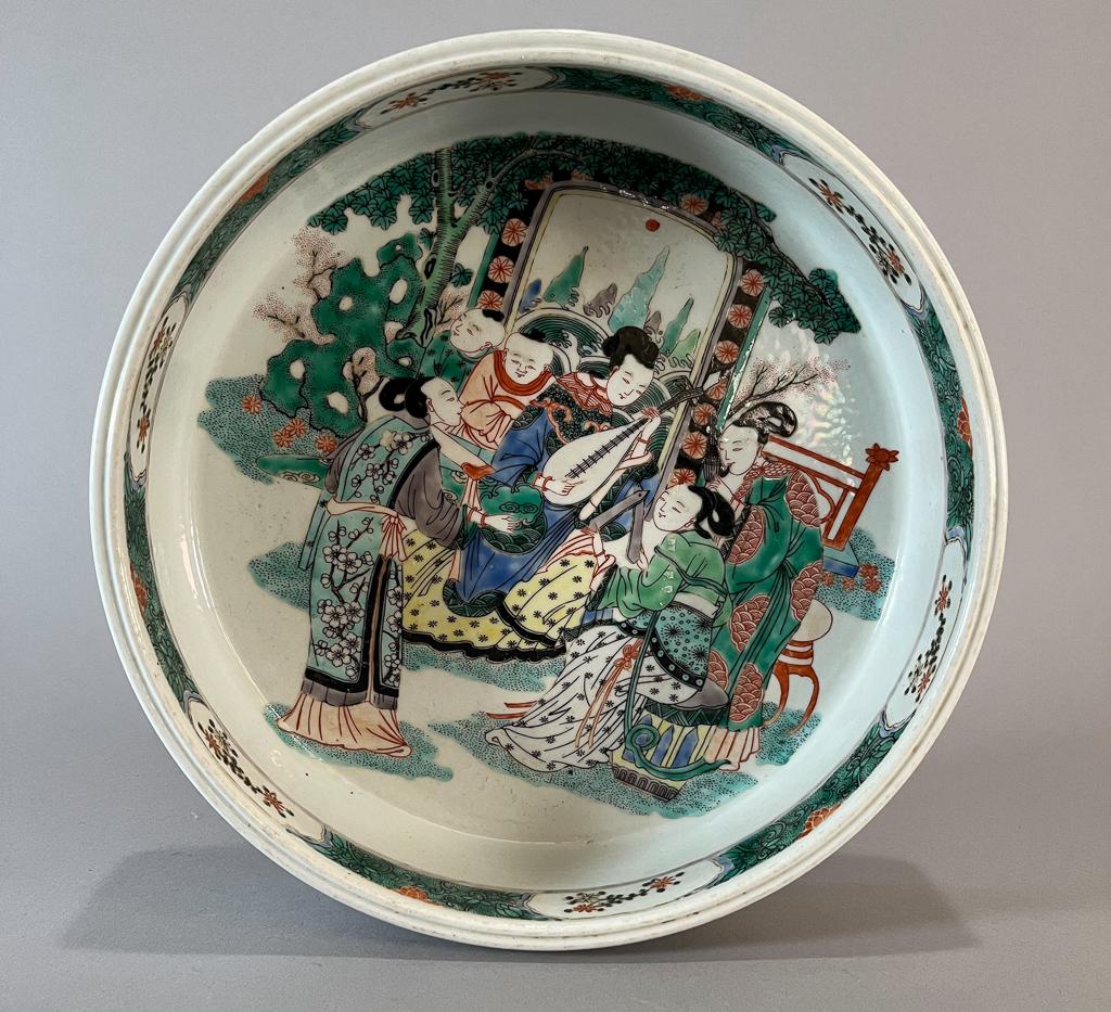 Large Chinese Enameled Porcelain Brush Washer: Large Chinese famille verte porcelain brush washer; the face depicts a scene with women and children, with the interior rim of foliate design and trees to the exterior sides; six-character mark to bas