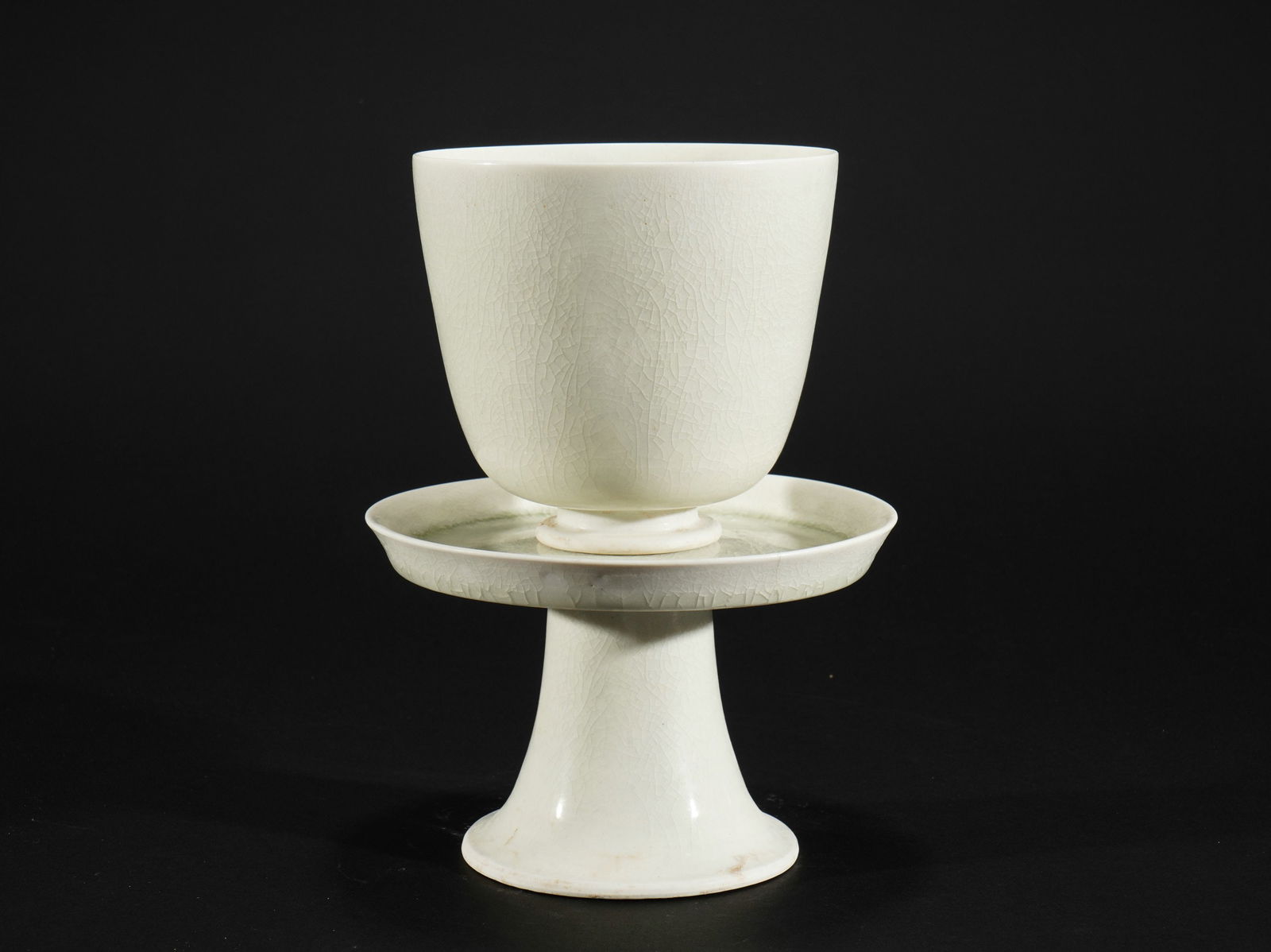 A celadon cup: Height 20cm Width 14.8cm