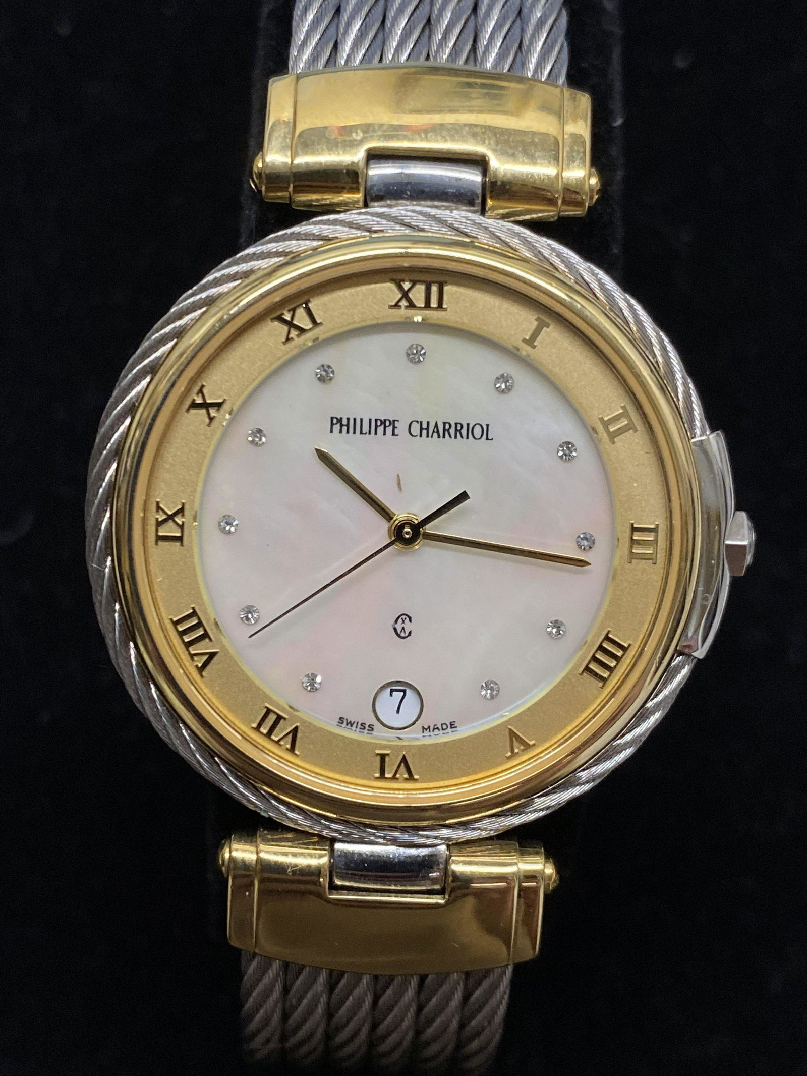 PHILIPPE CHARRIOL Two-Tone Stainless Steel & Yellow: Philippe Charriol has consistently exceeded expectations with phenomenal products, and there is no exception for this stunning gold tone and steel wristwatch. This highly coveted Swiss-made timepiece