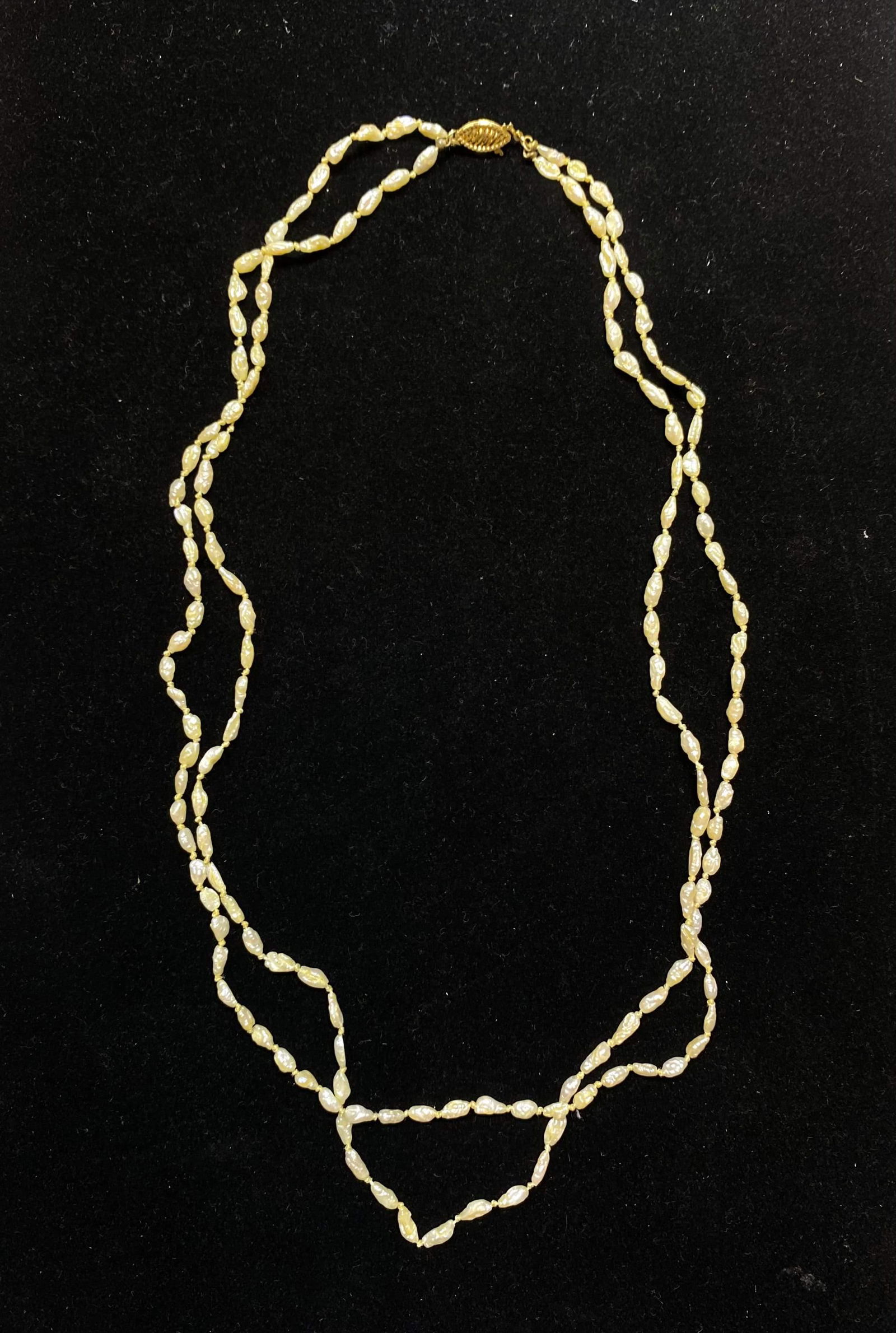 146-Baroque Pearls Double Strand Necklace in Solid: The joy of wearing a piece of art on your neck is within reach when you grab this stunning Baroque Pearl Double Strand necklace! This baroque pearls in 14K yellow gold golds are approximately 2mm and