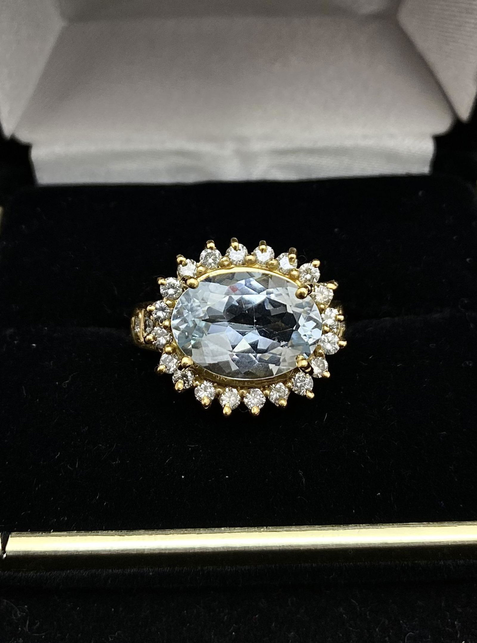 Amazing 6 Ct. Aquamarine Ring with 24-Diamonds! - $25K Appraisal Value w/ Certificate of: UNIQUE DESIGNER AQUAMARINE & DIAMONDS RING IN SOLID YELLOW GOLD - $25K APPRAISAL VALUE!ITEM DESCRIPTION:The joy of wearing a piece of art on your finger is within reach when you grab this stunning des