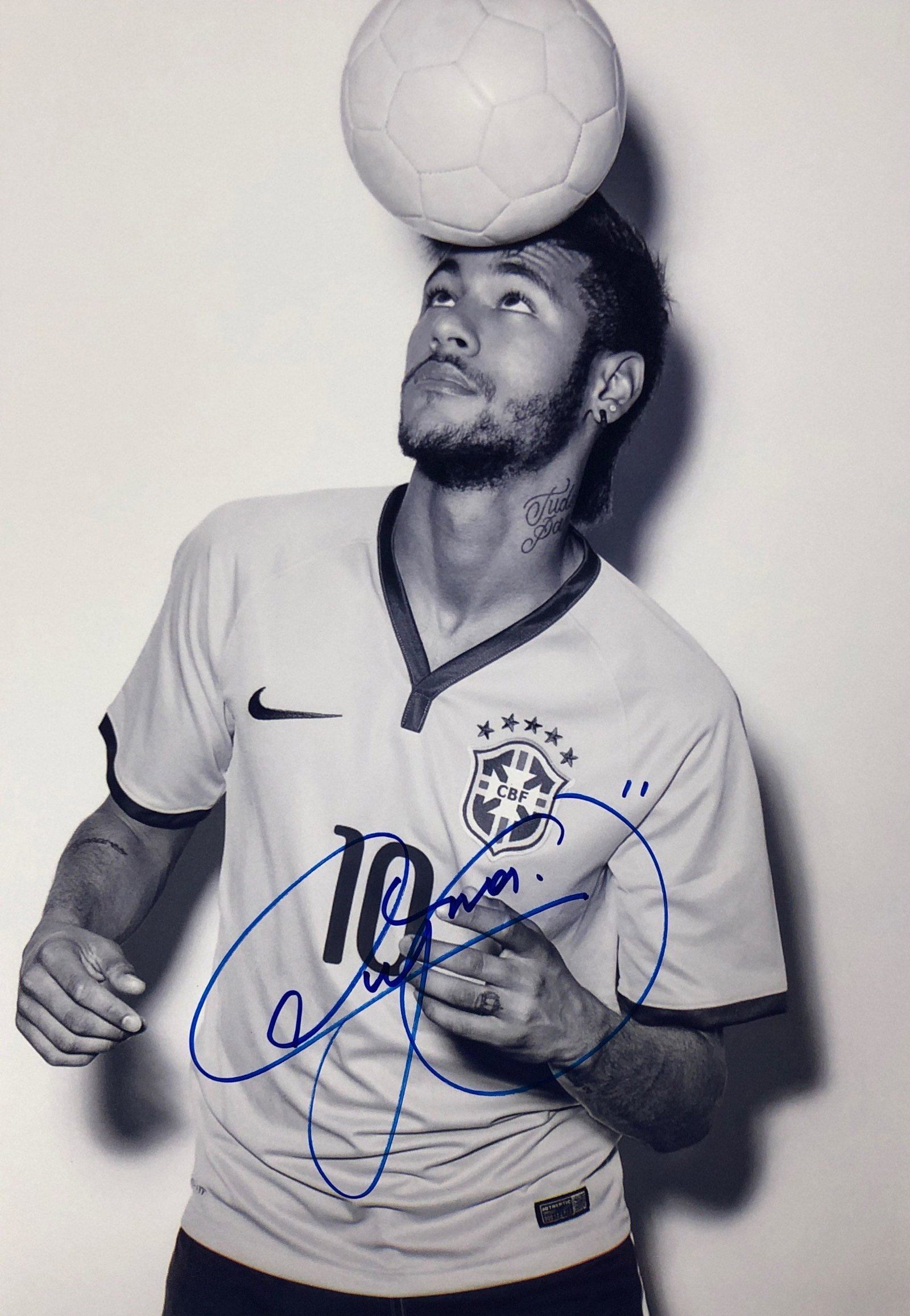 Neymar Signed Photo: Autographed by:NeymarAuthentication Code: PC26039Item is in great condition with no damage, unframed If image of documentation is not attached in the listing, the lot is sold without documents. Please