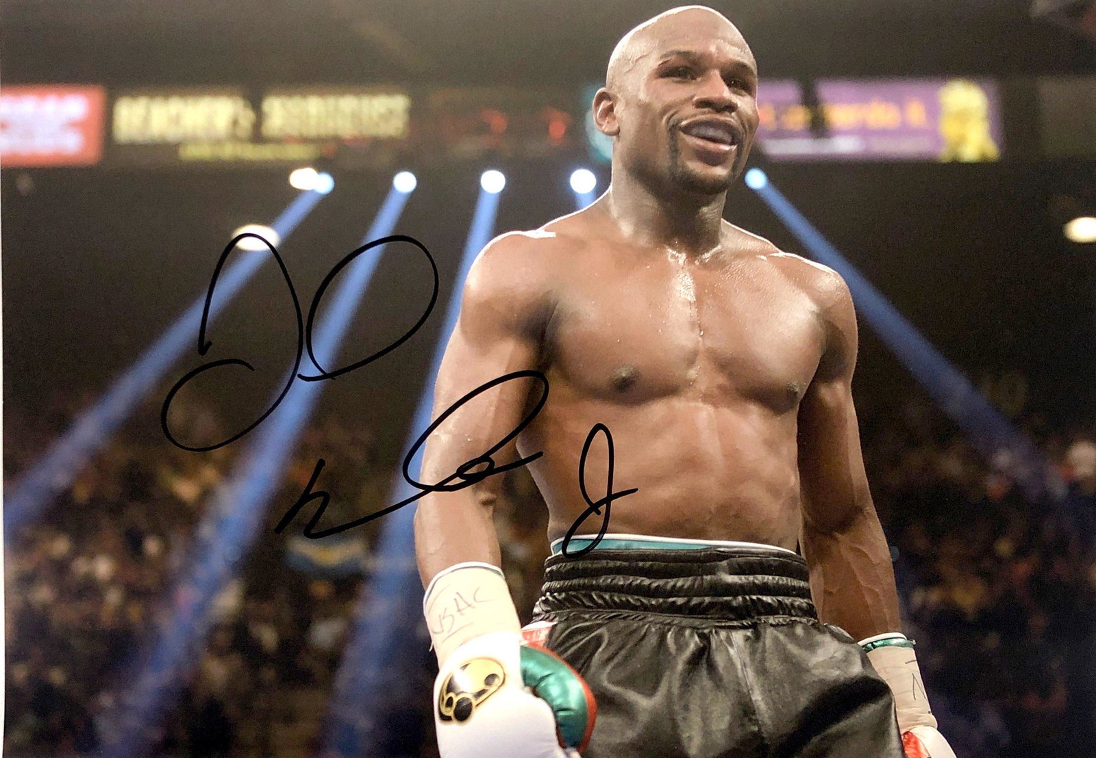 Floyd MayweatherAutograph Signed Photo: Category: Autograph Photo CollectiblesSize: Width 8 inches x Height 10 inchesAutograph Includes: Floyd MayweatherItem is in great condition with no damage, unframedIf image of documentation is not att