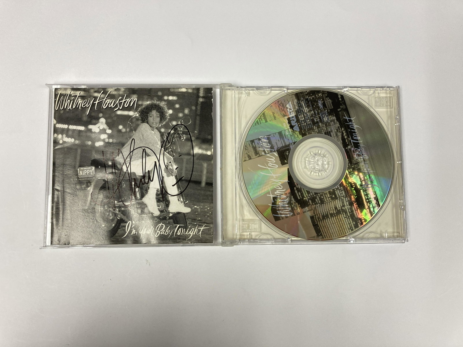 Autograph Signed Whitney Houston Your Baby Tonight CD: Category: Autograph CollectiblesAutograph Includes: Whitney HoustonItem is in great condition with no damage, unframedIf image of documentation is not attached in the listing, the lot is sold without 